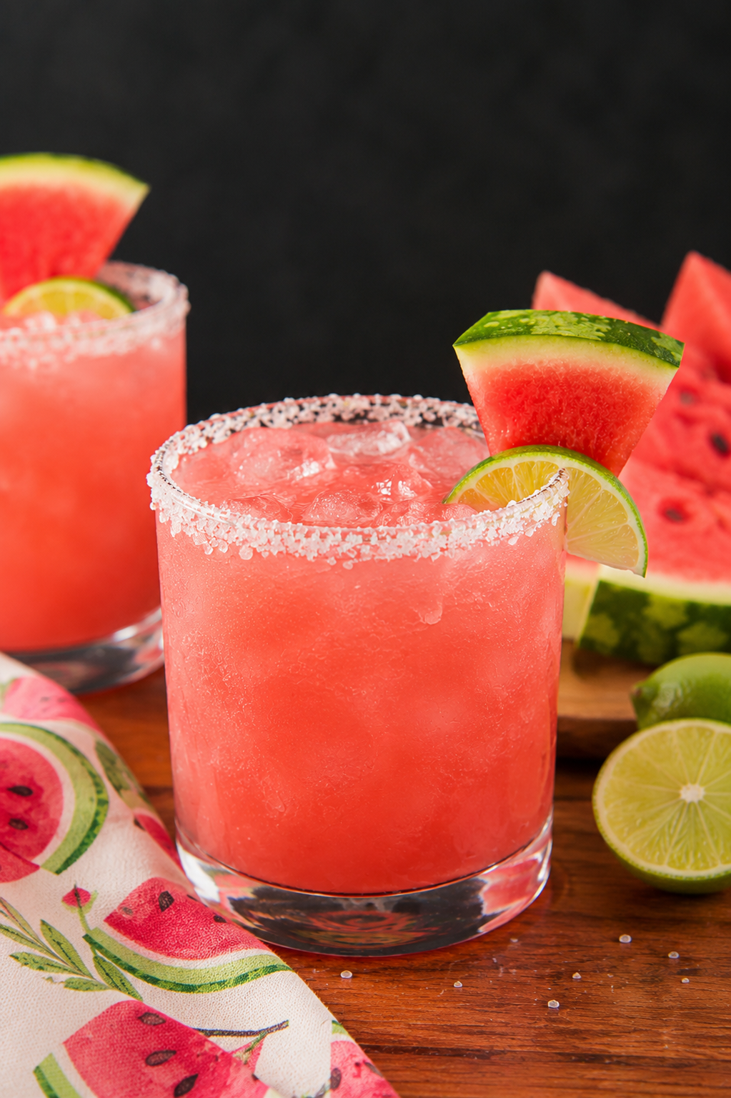 WATERMELON MARGARITA ON A DARK WOOD TABLE