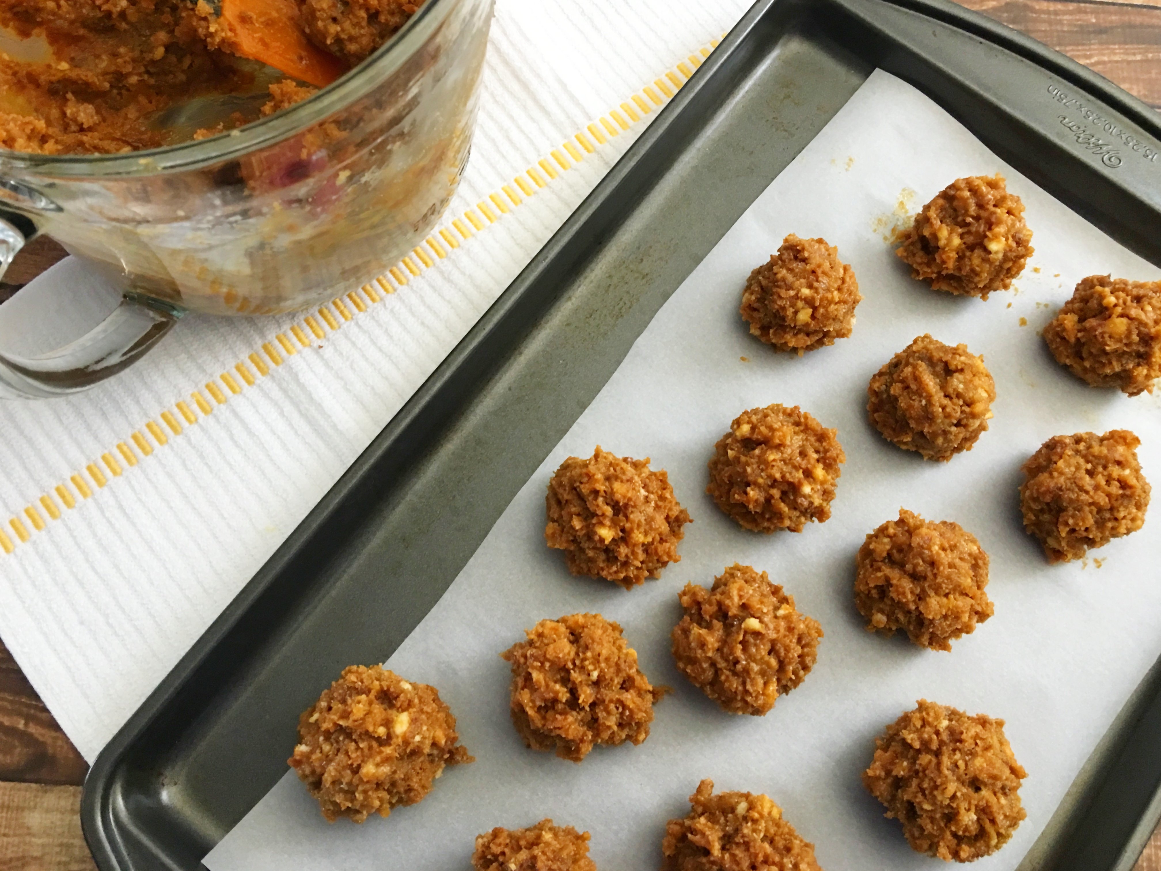 Samoa Bites without the chocolate on a parchment paper lined baking sheet