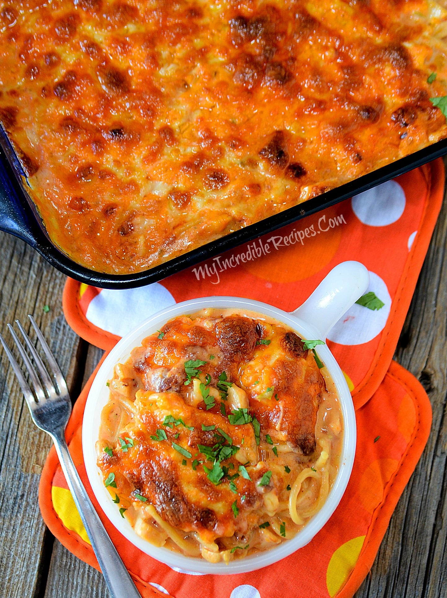 overhead shot of Cheesy Chicken Spaghetti in a white bowl