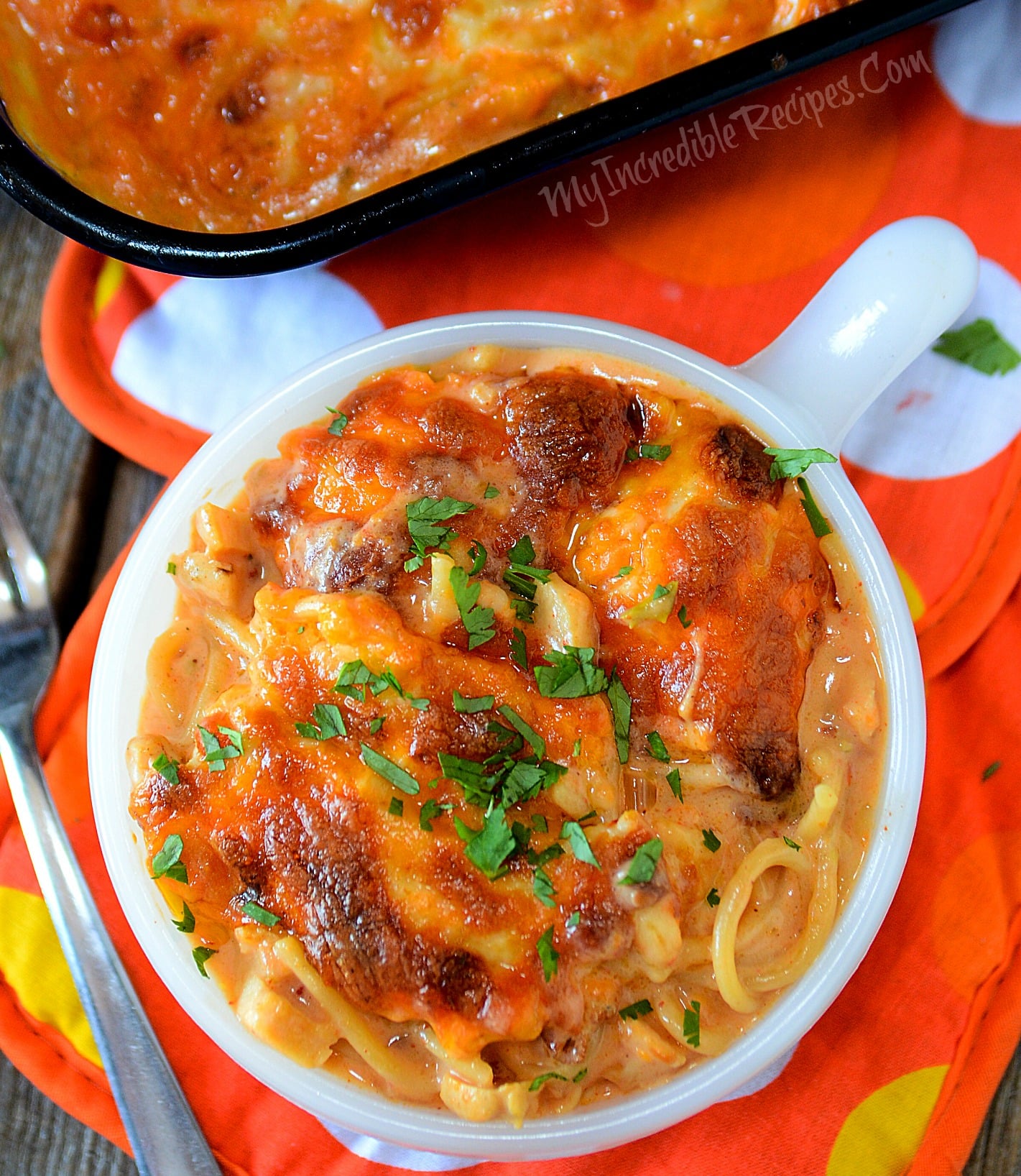 Cheesy Chicken Spaghetti in a white bowl