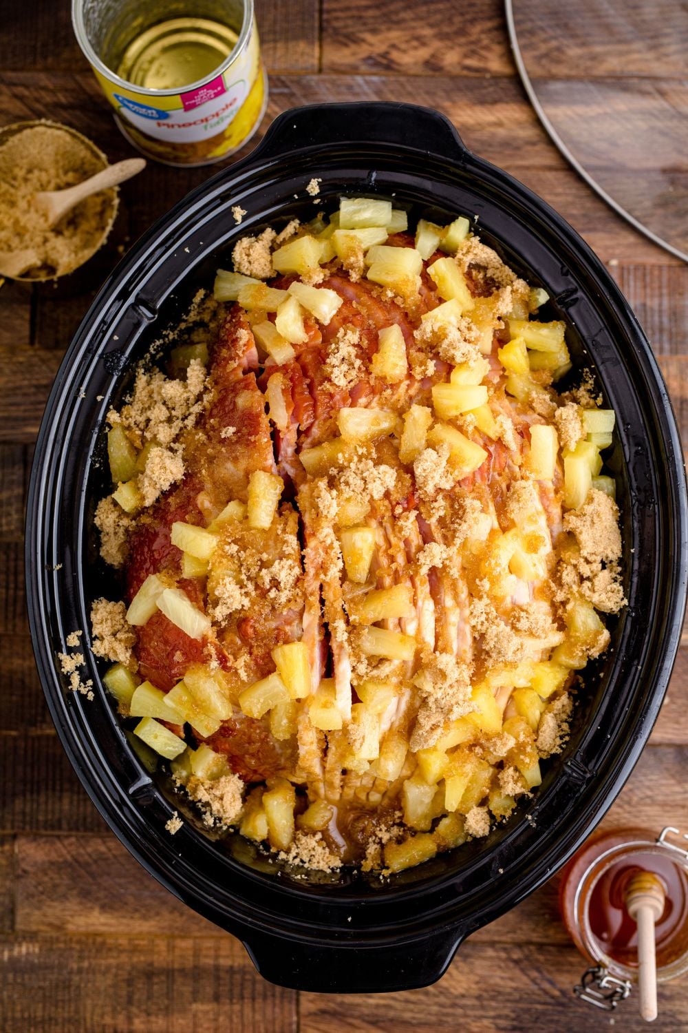 pinepple, brown sugar, ham and honey in a crockpot 