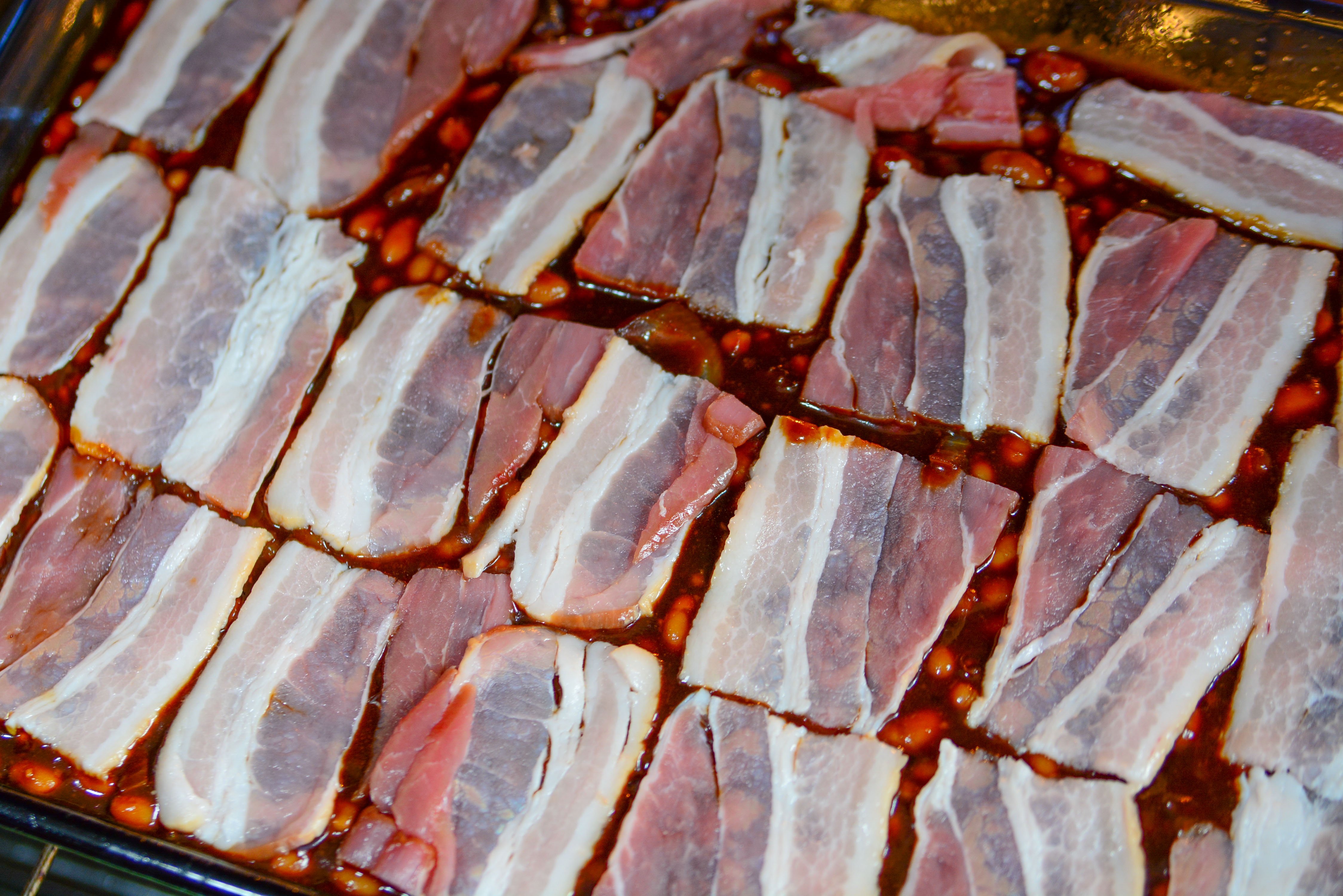 Brown Sugar Bacon Baked Beans in a baking dish uncooked