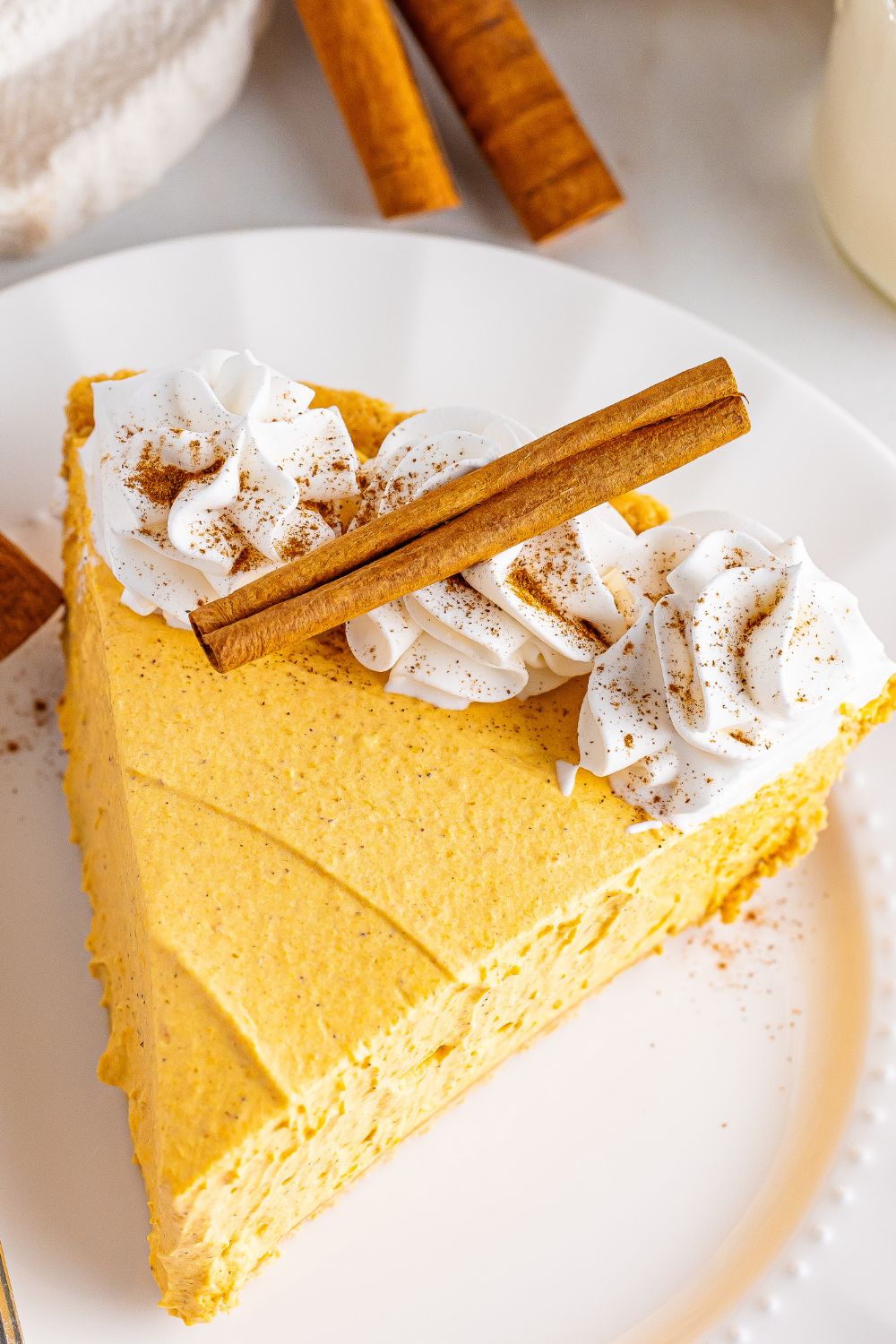 overhead shot of pumpkin cheesecake on plate