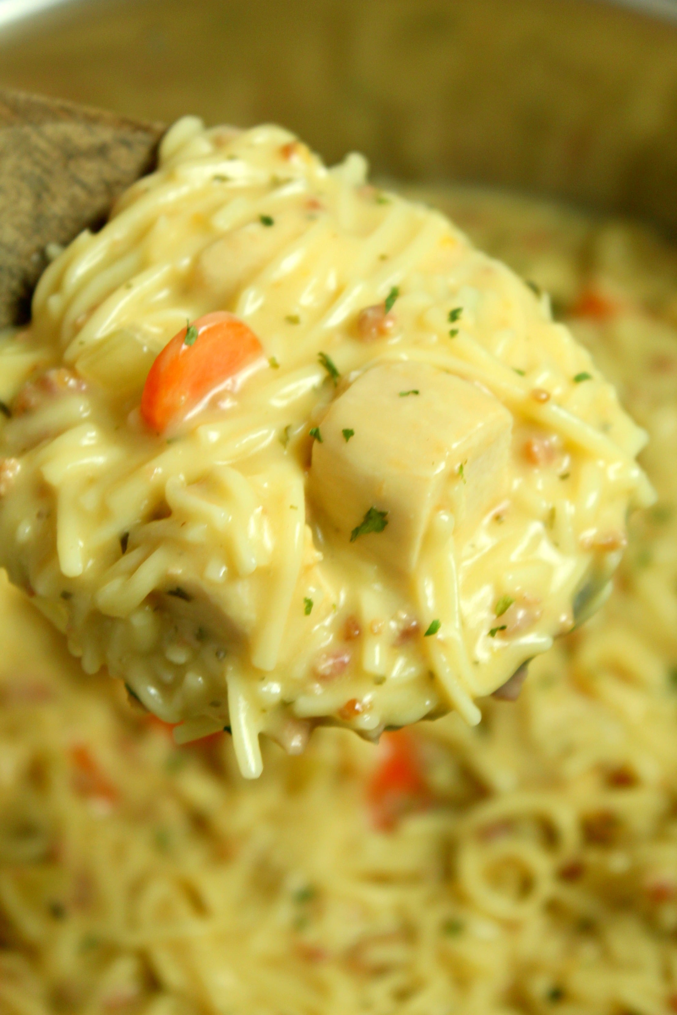Crack Chicken Noodle Soup on a large pot on a table