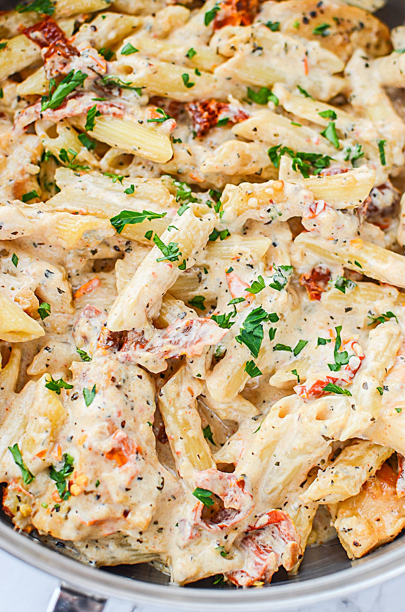 Creamy Sun Dried Tomato Chicken Pasta!