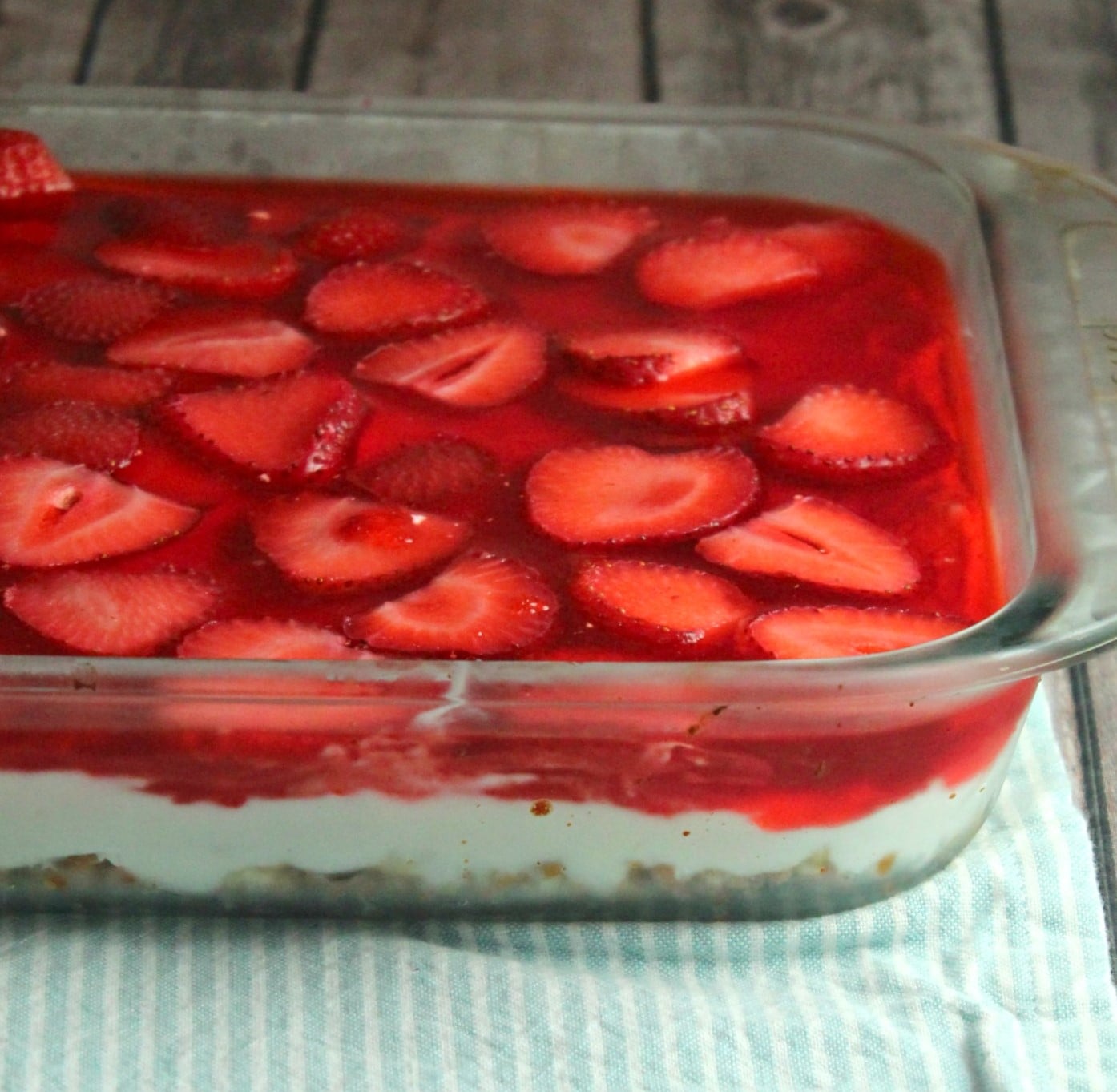 old image of my Strawberry Pretzel Salad in a clear baking pan