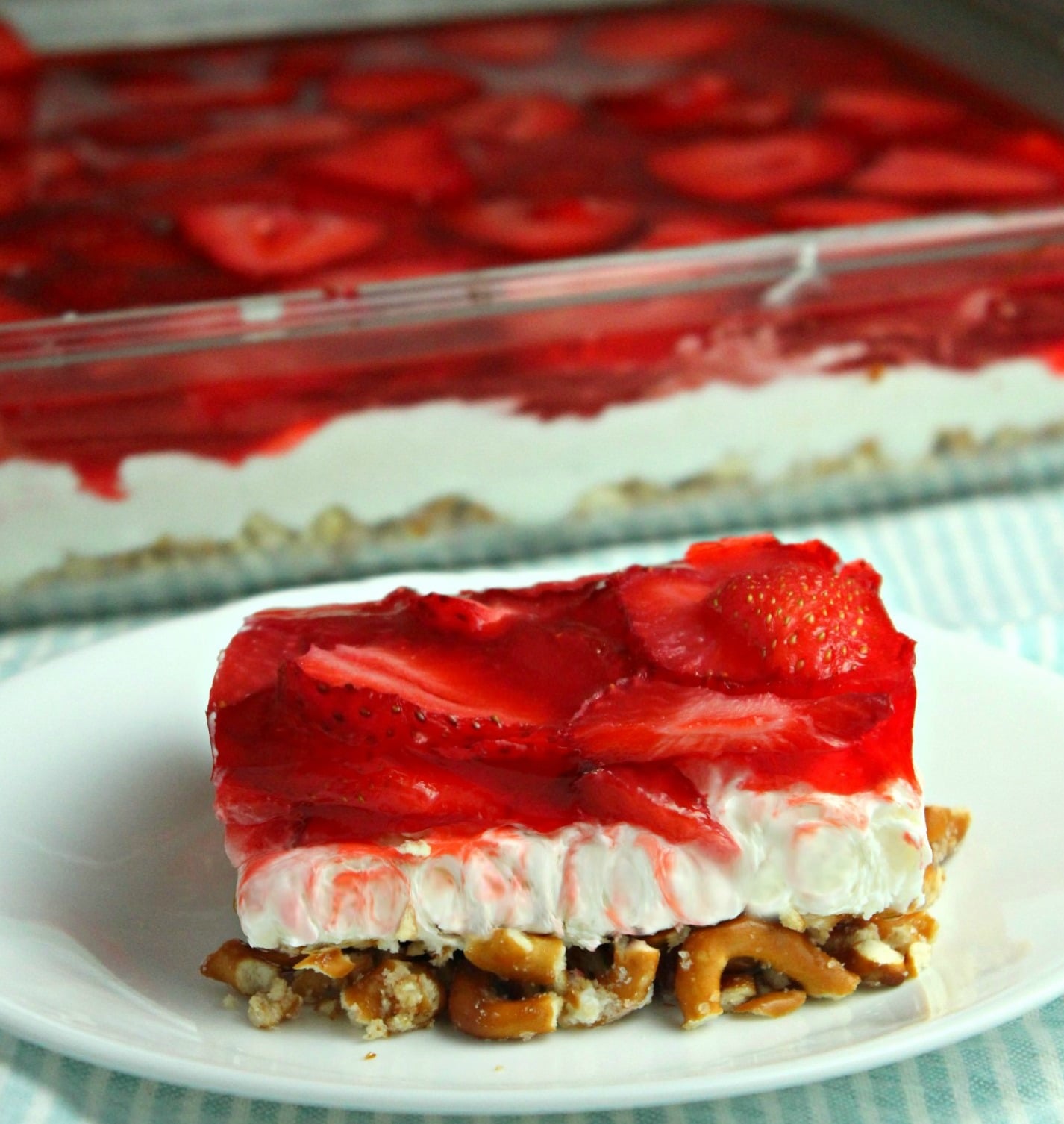 old image of my Strawberry Pretzel Salad on a pretty white plate