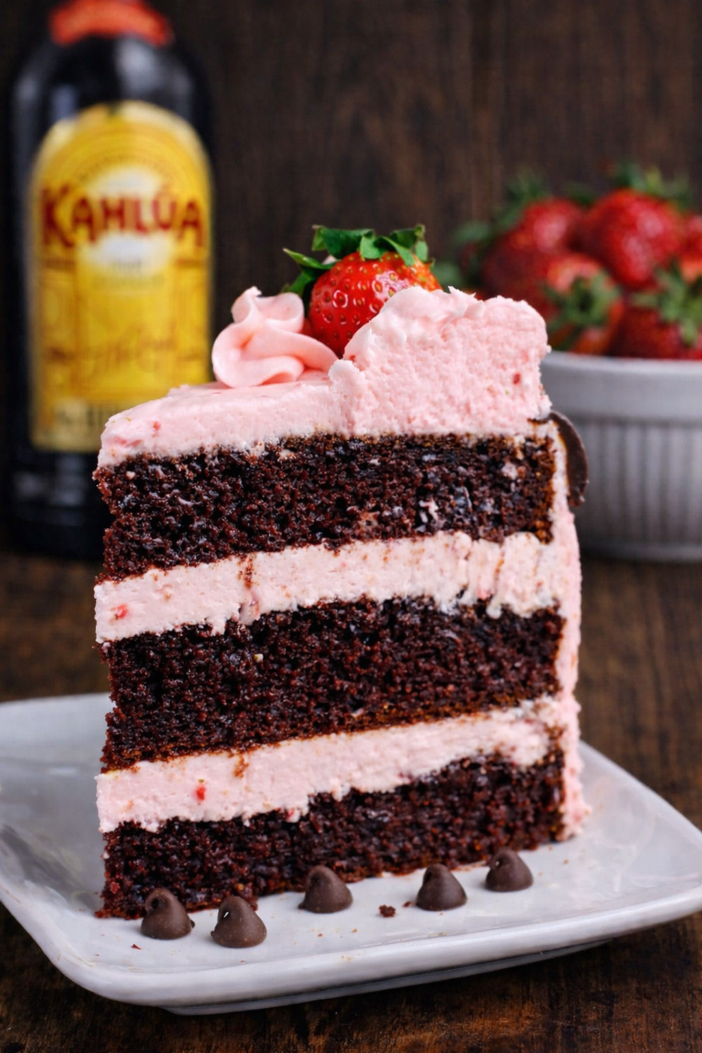 Chocolate Kahlua Cake Slice on a white plate with a dark background