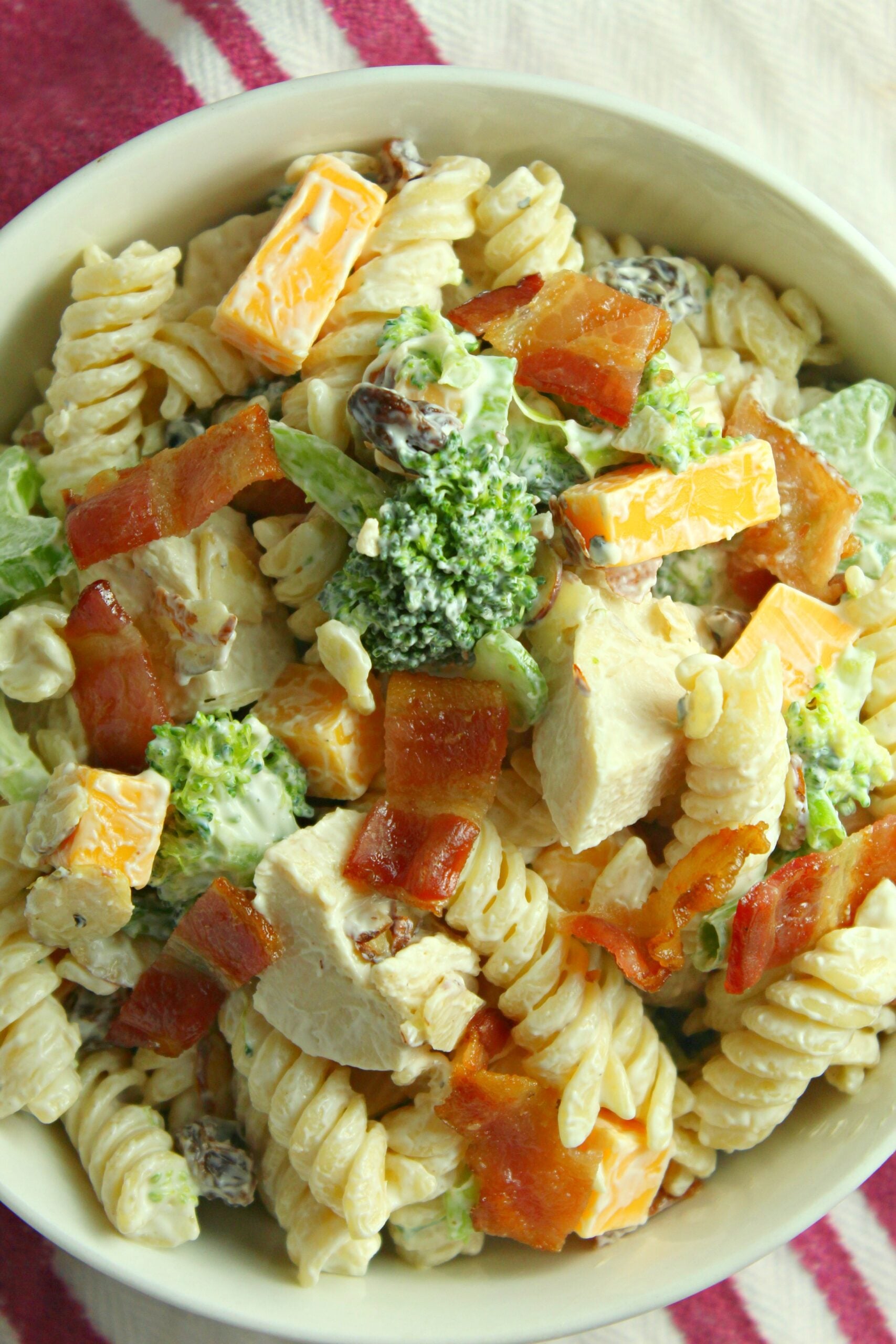 Chicken Bacon Broccoli Pasta Salad in a big pretty white designed bowl