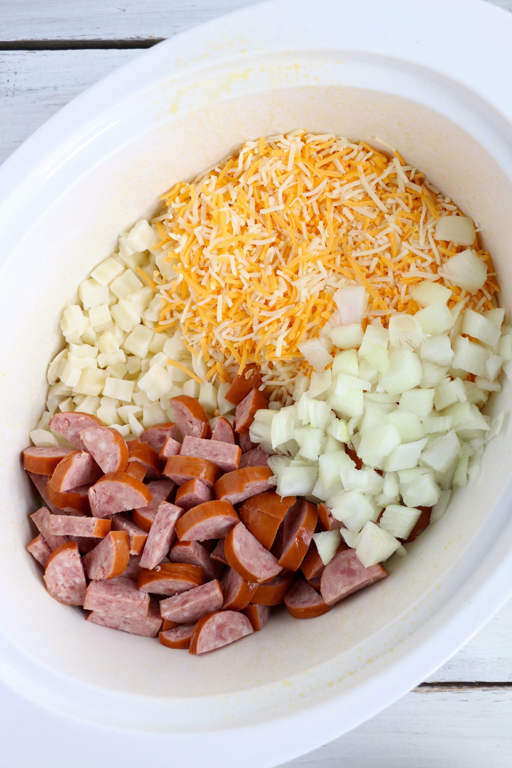 Slow Cooker Cheesy Kielbasa Hashbrown Casserole
