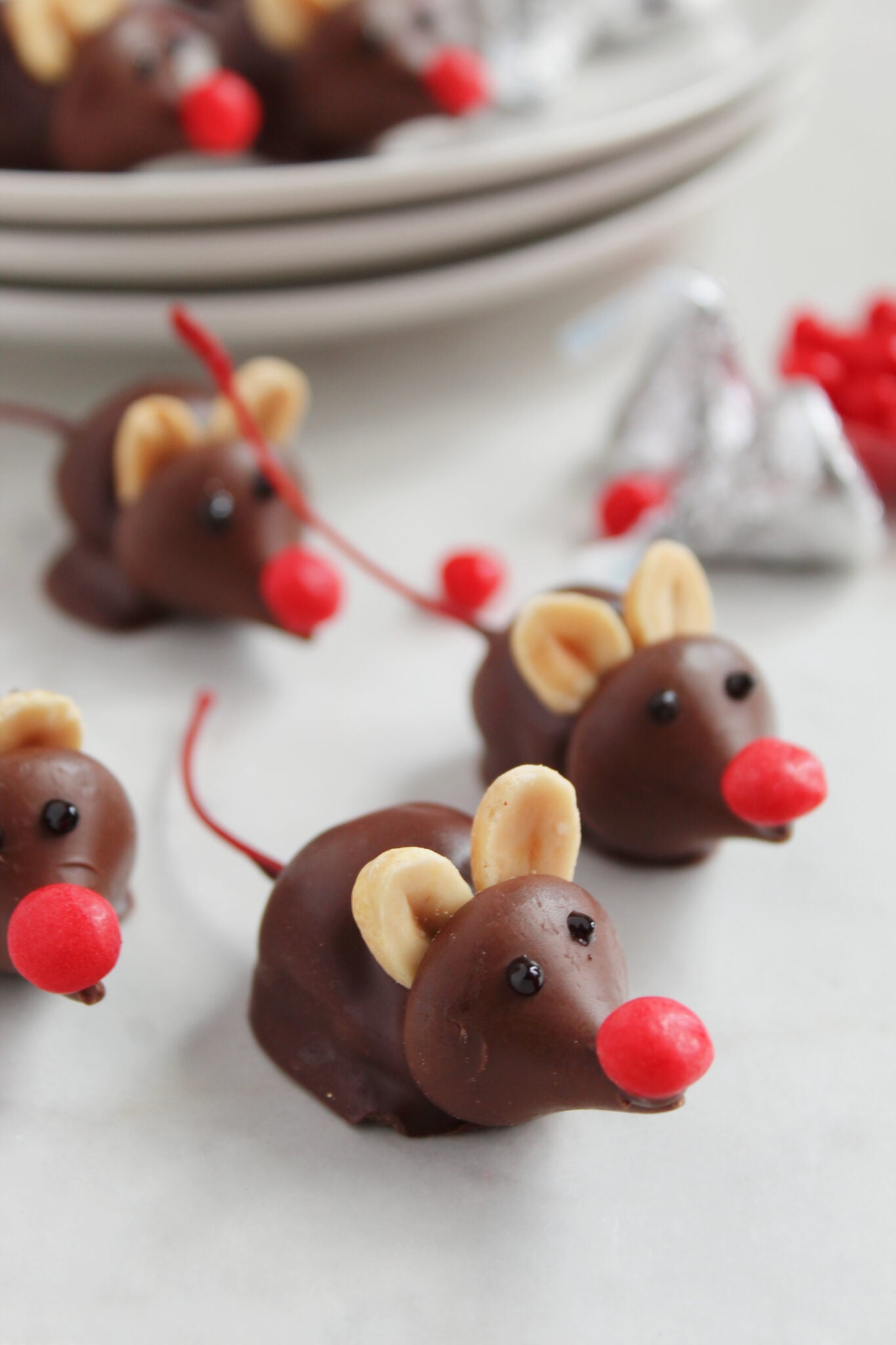 Mice candy with red noses and cherry stem tails