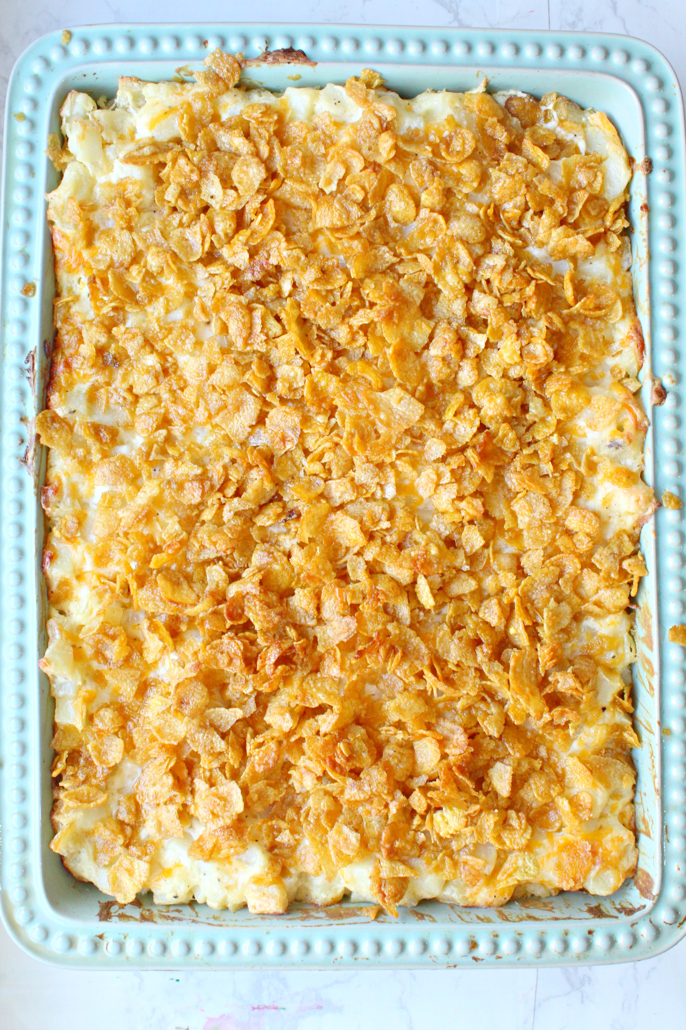 overhead shot of Funeral Potatoes in a baking pan