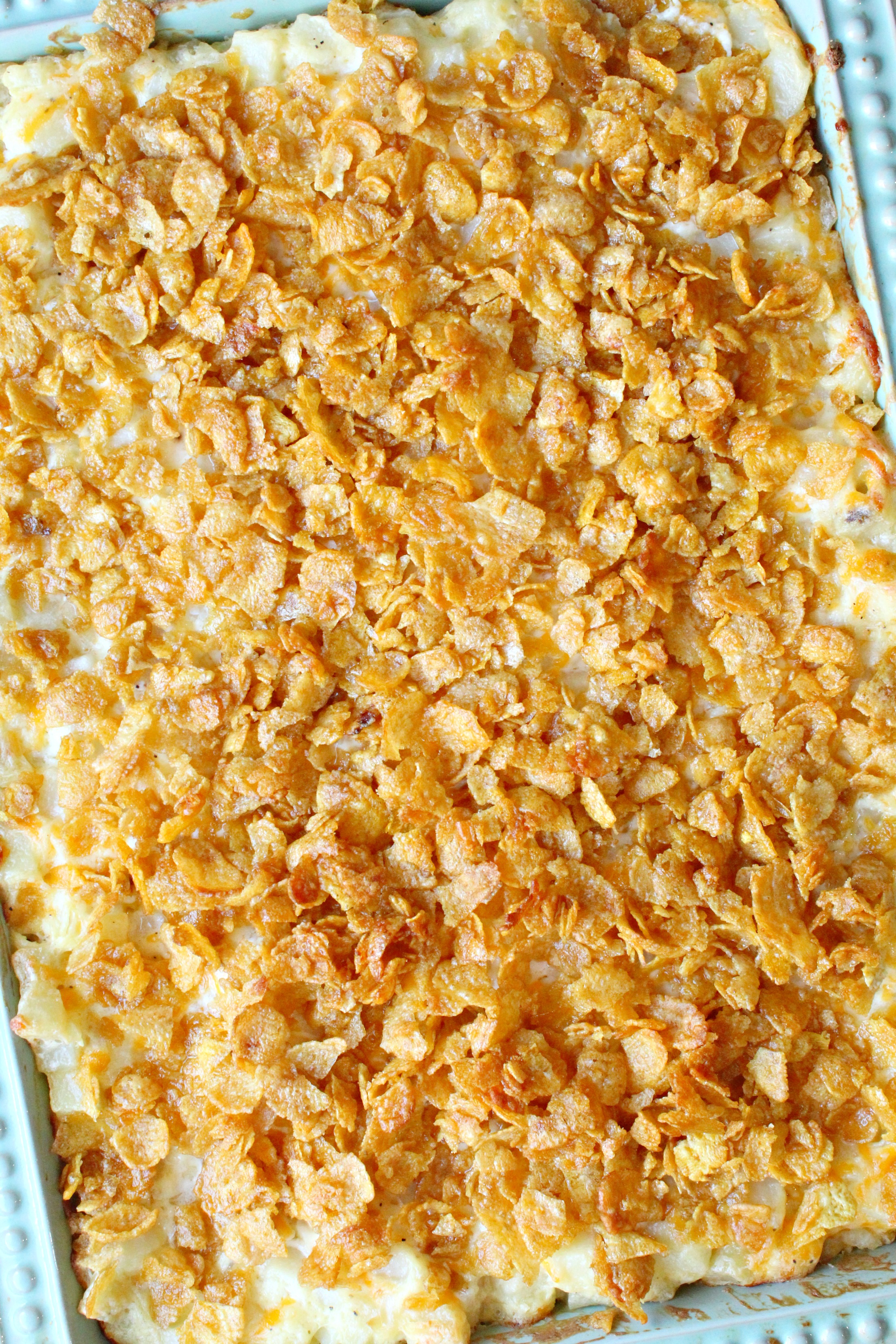 overhead angle shot of the Funeral Potatoes in a baking pan