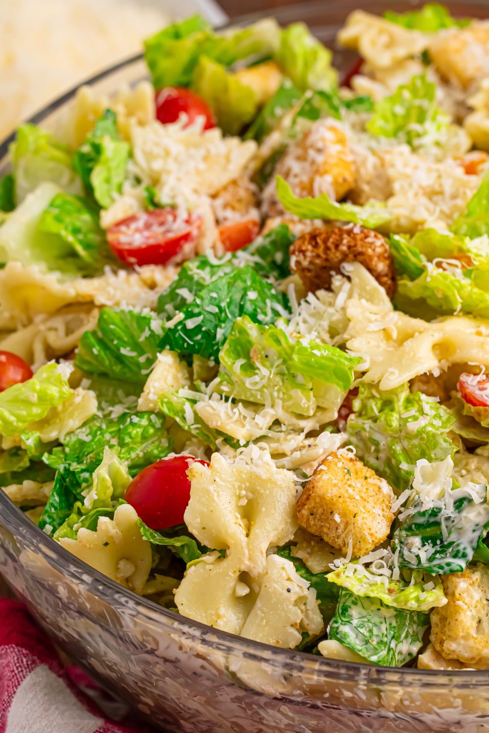 Chicken Caesar Pasta Salad in a glass bowl 