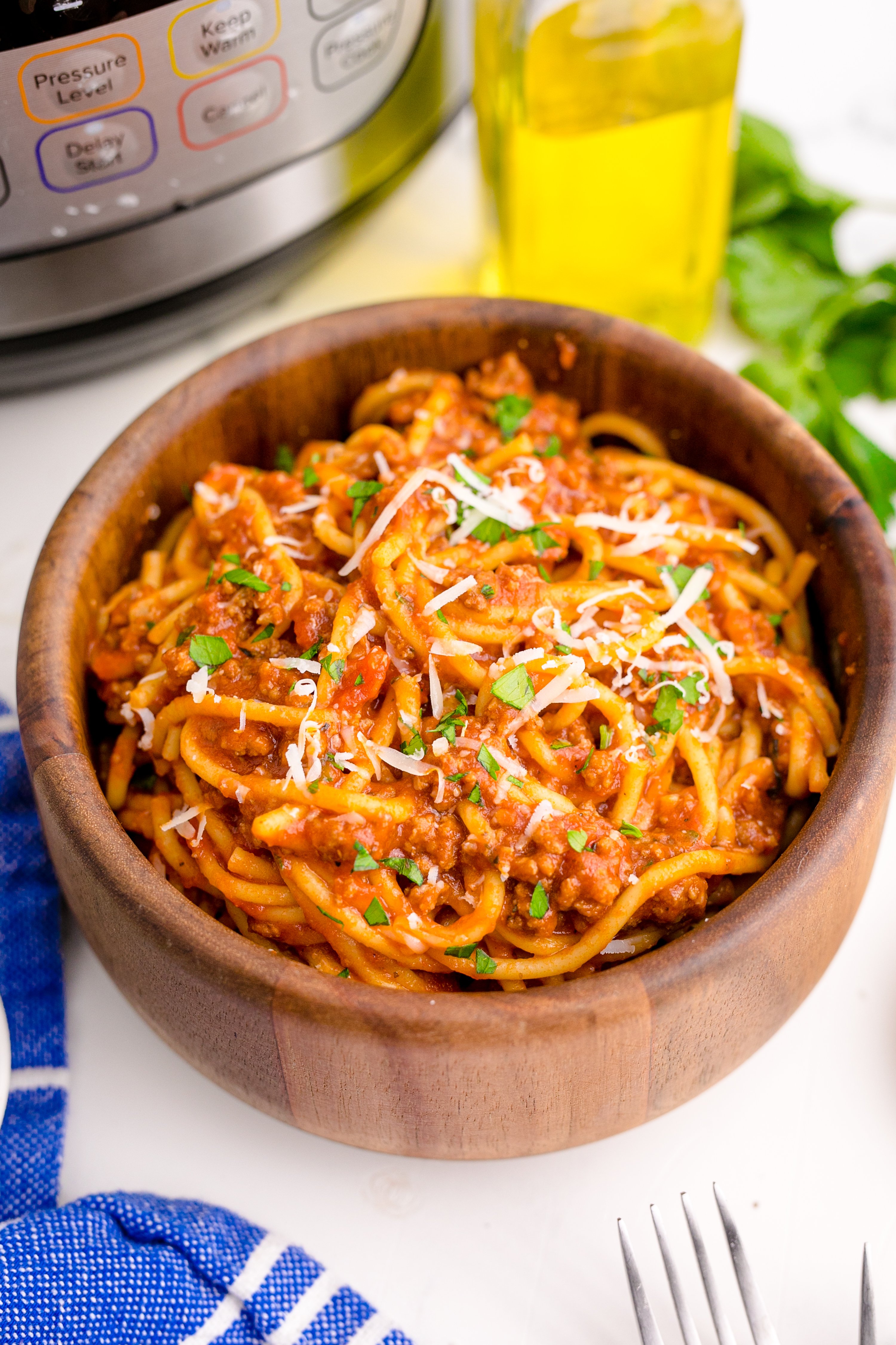 Instant Pot Spaghetti in a wooden bowl overhead shot