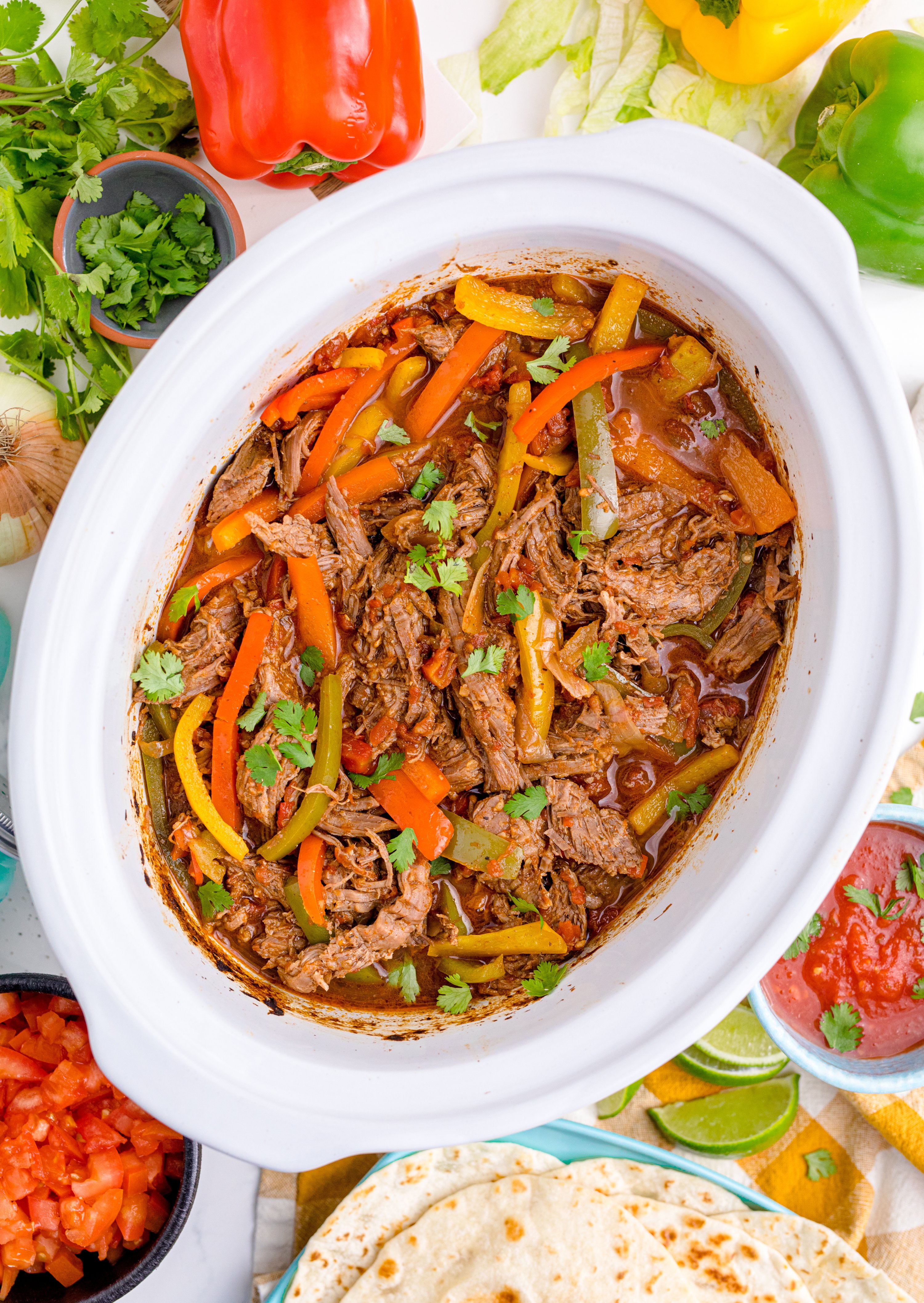 Steak Fajitas in a white crock pot