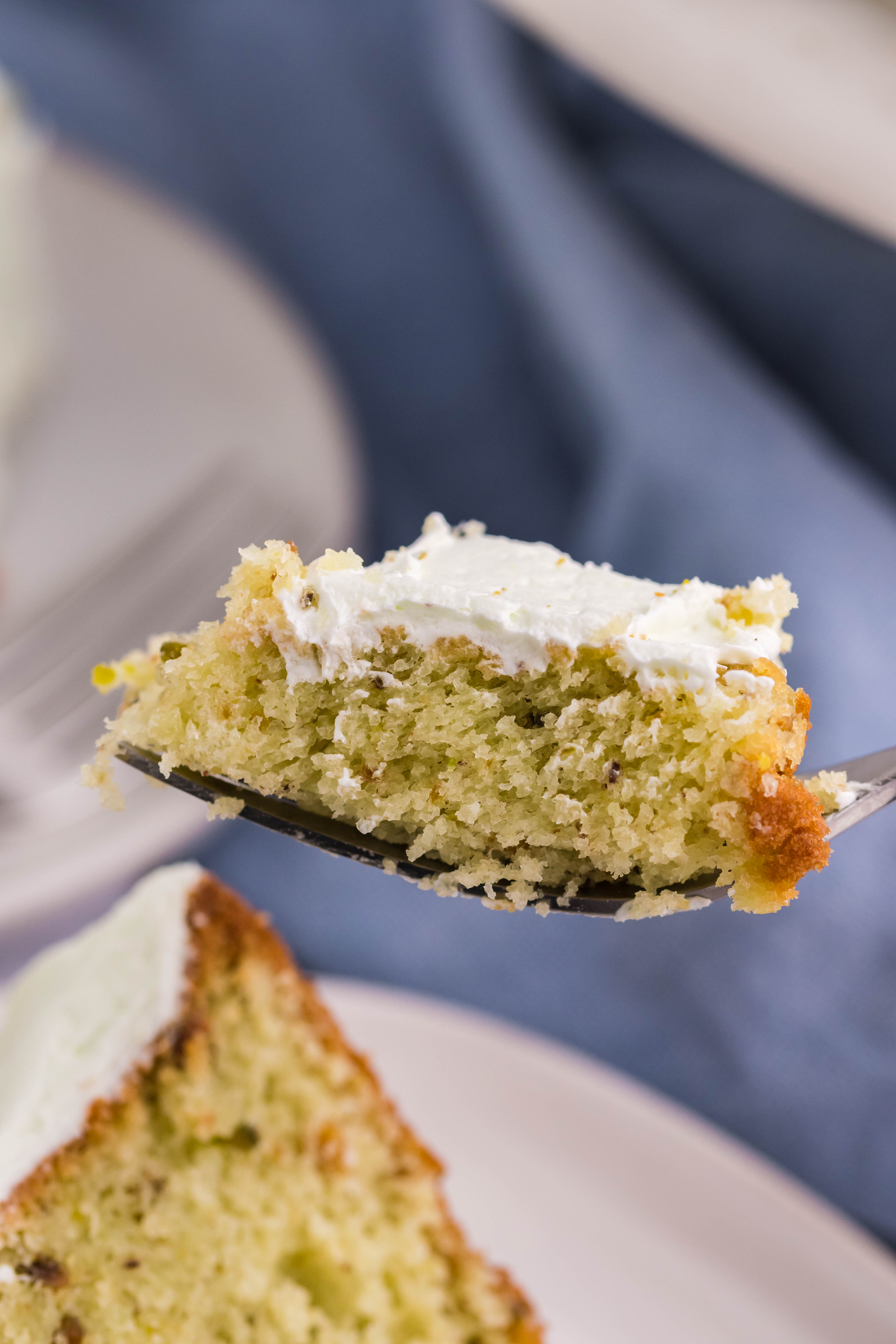 Pistachio Cake bite on a fork
