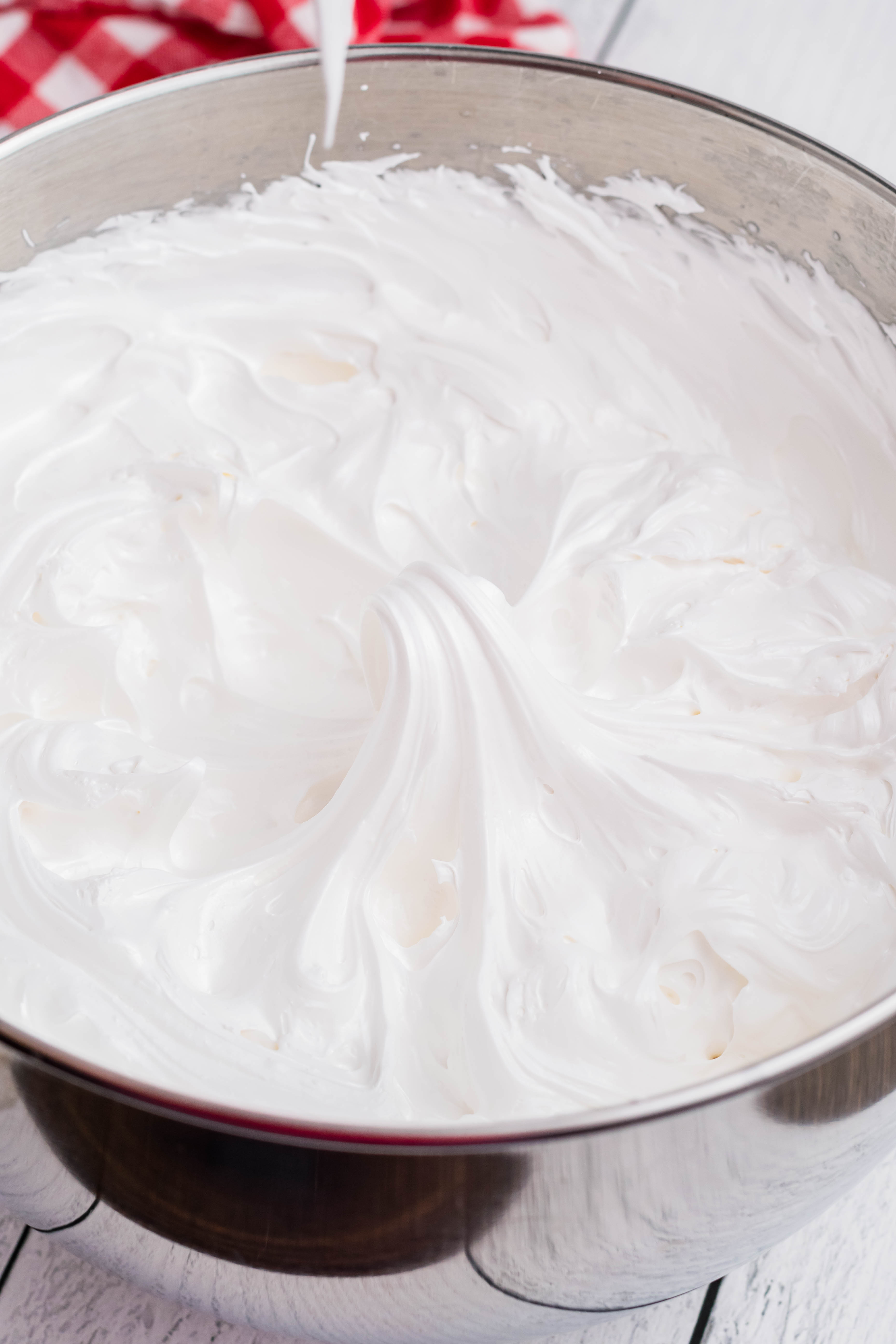 marshmallow frosting in a steel bowl