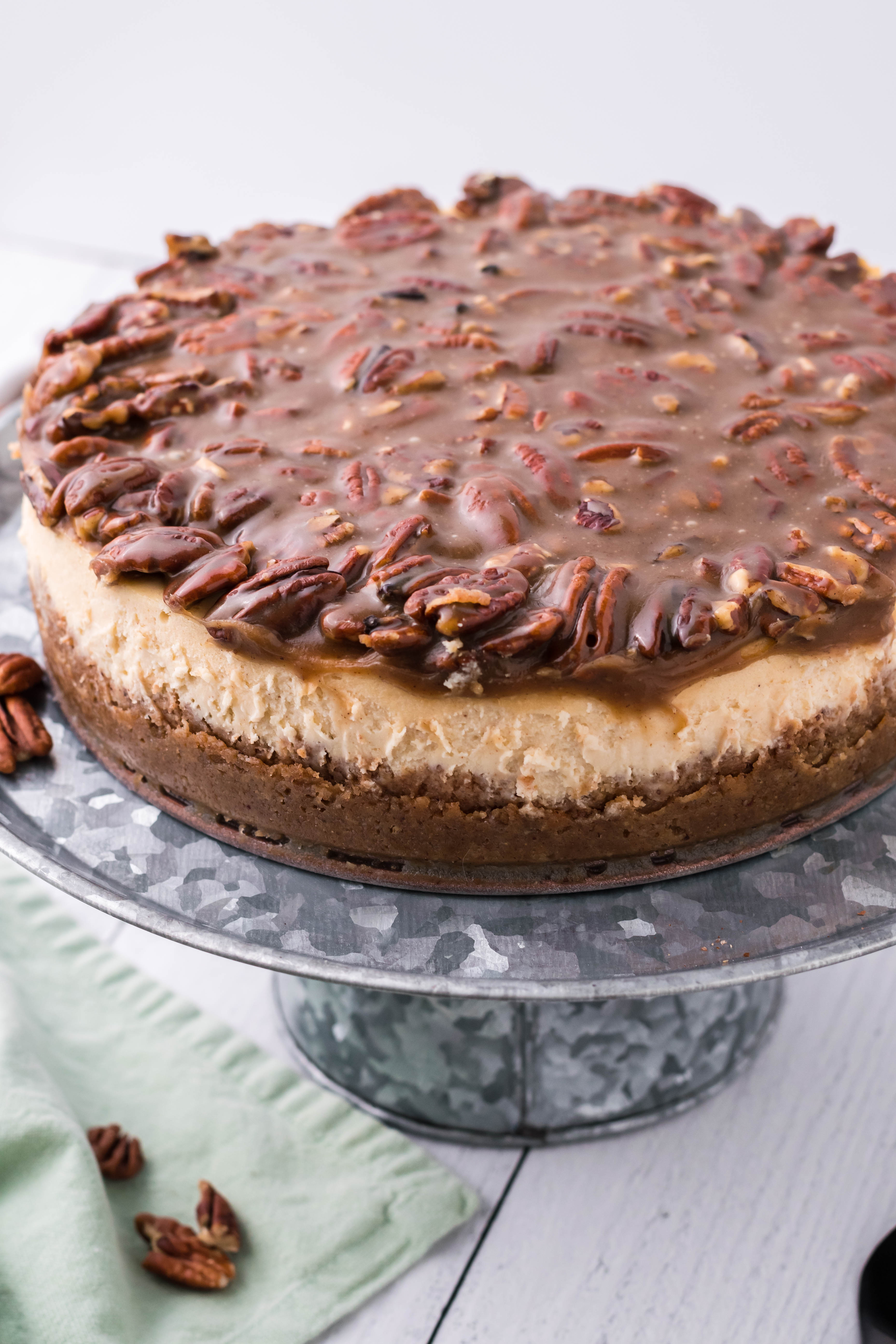 pecan pie Cheesecake on a sliver cake stand