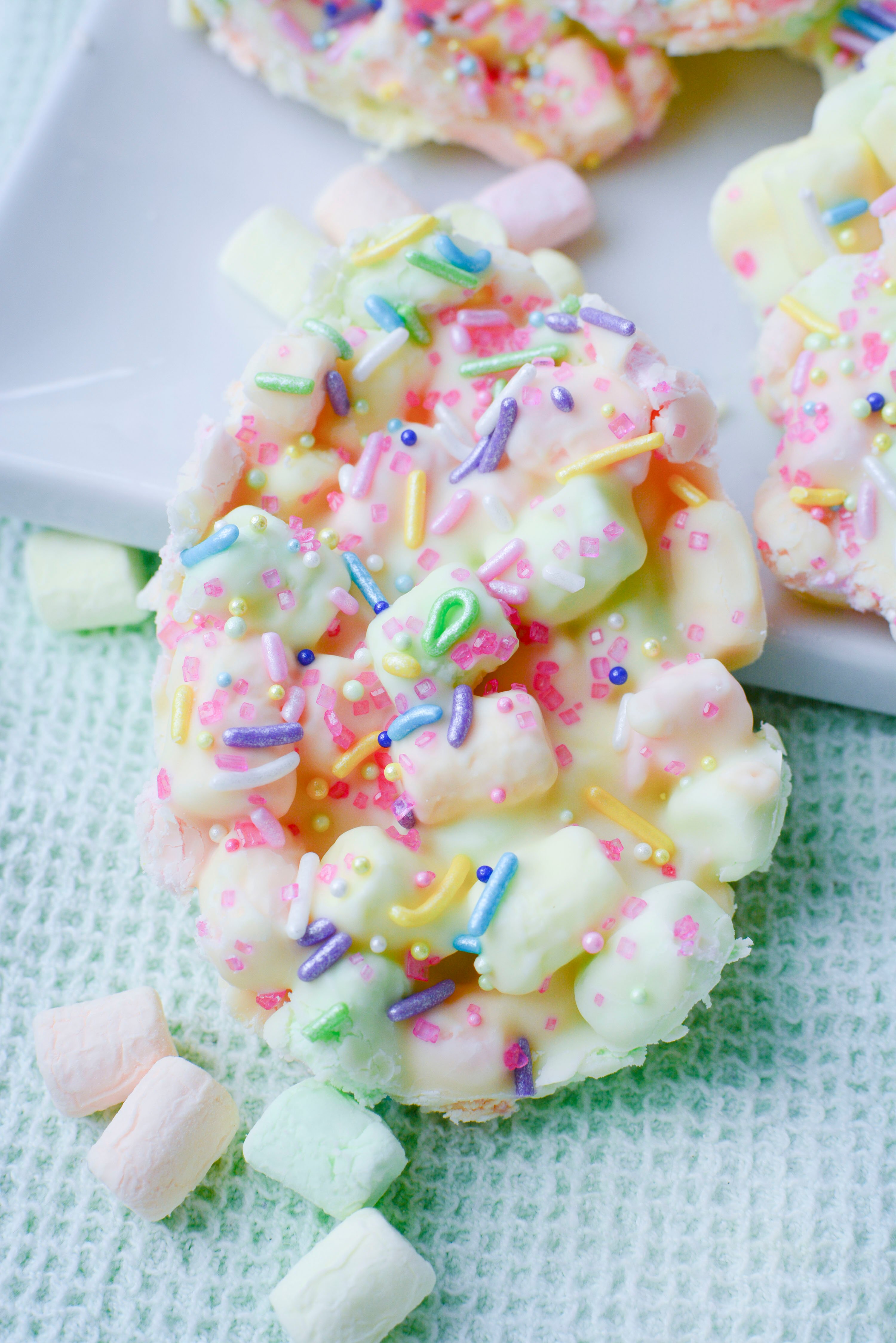 Easter Marshmallow treats with pink, green and yellow mini marshmallows cut into the shape of eggs