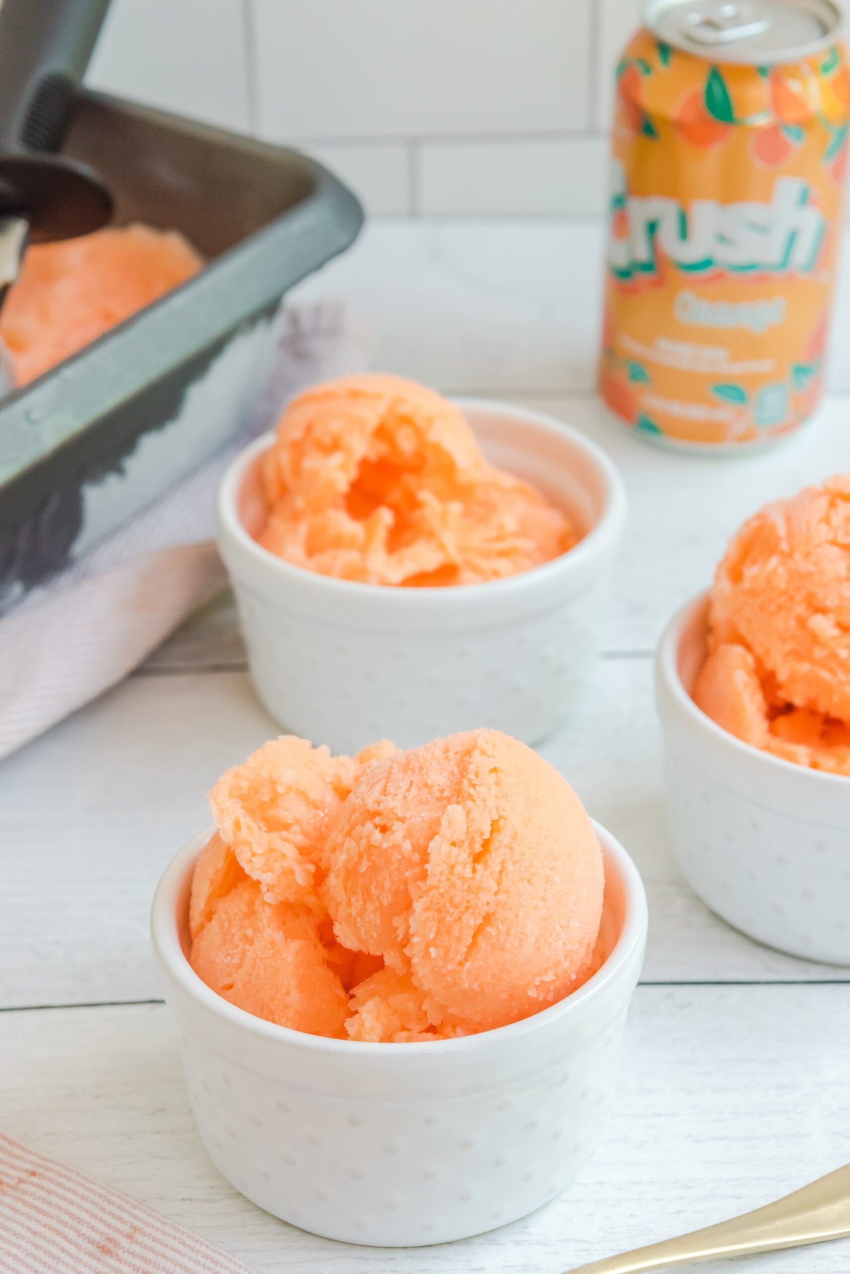 Orange Crush Sherbet in a white bowl