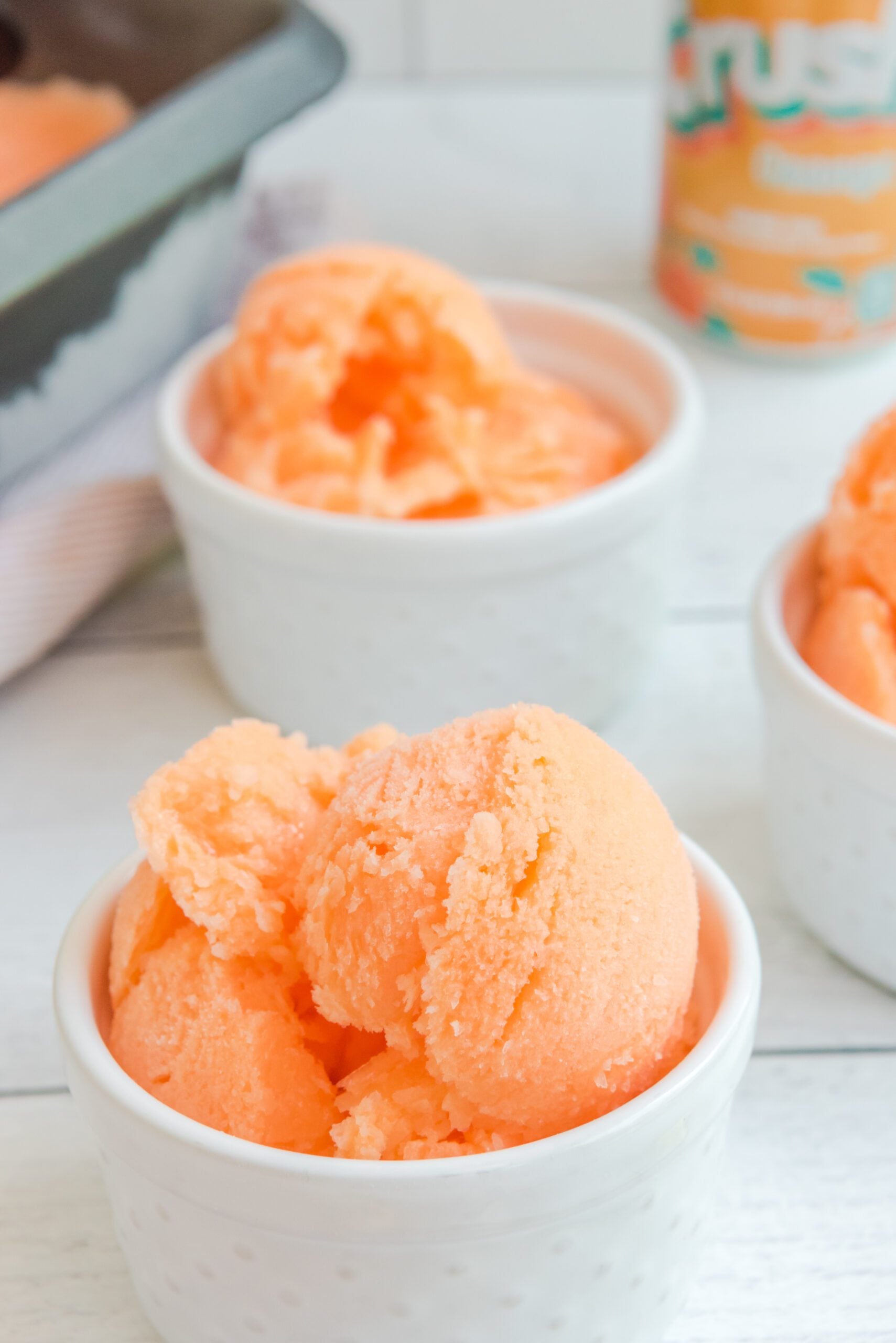 Orange Crush Sherbet in a white bowl