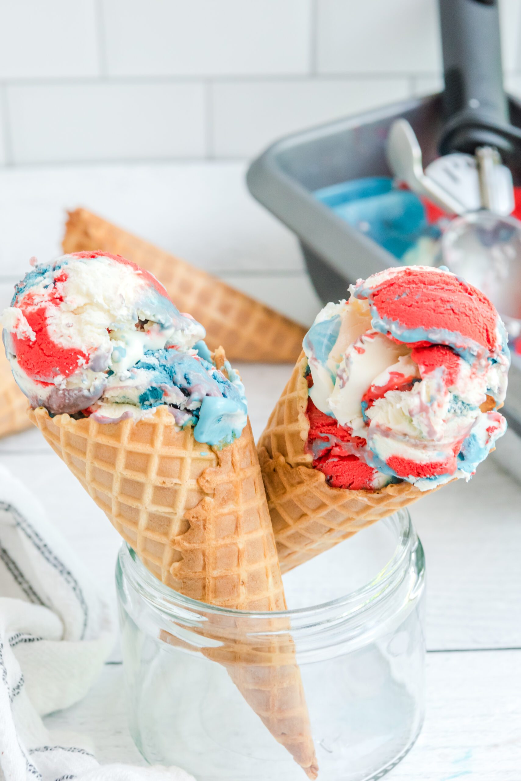 Red, White & Blue Ice Cream in two waffle cones