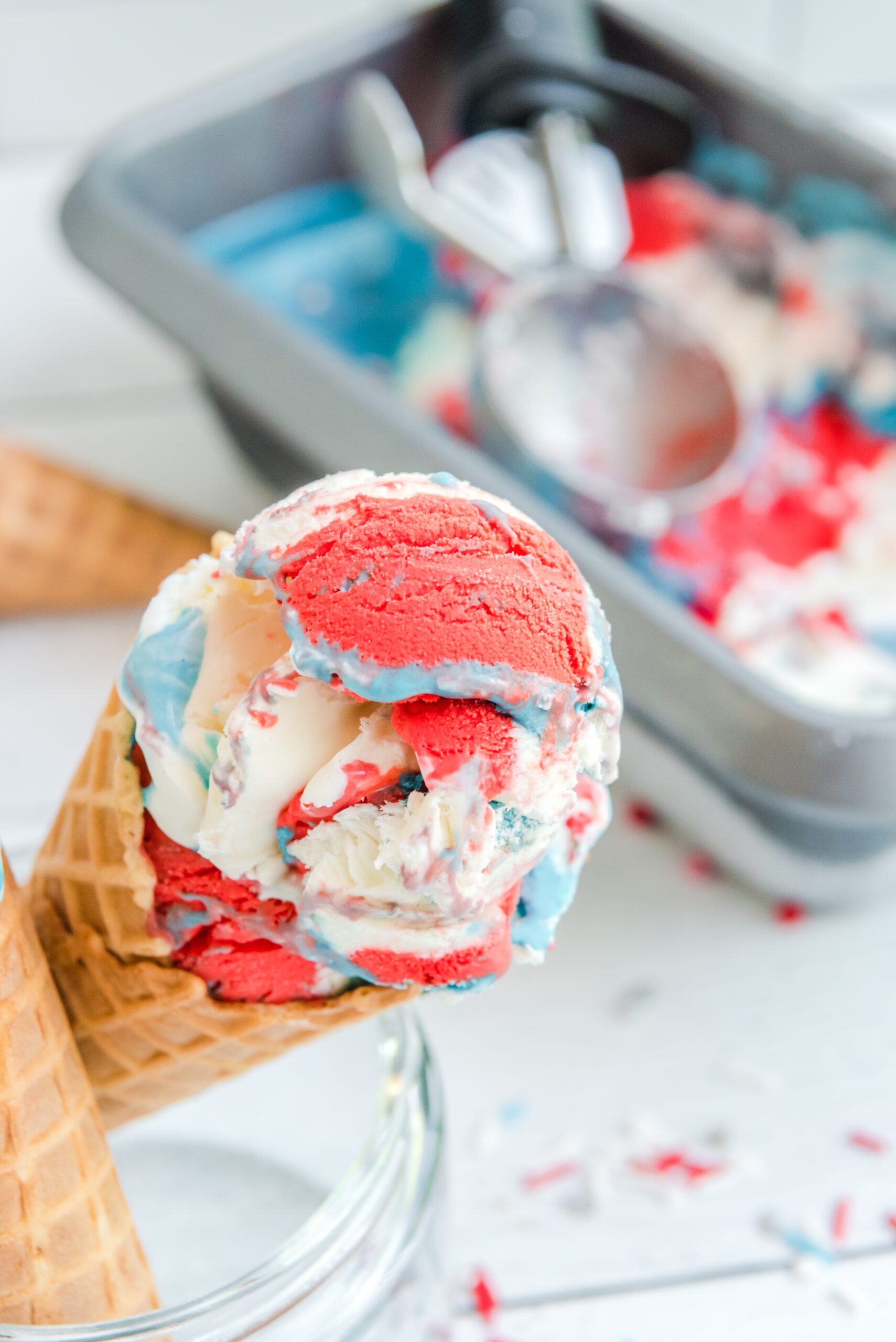 Red, White & Blue Ice Cream in a waffle cone