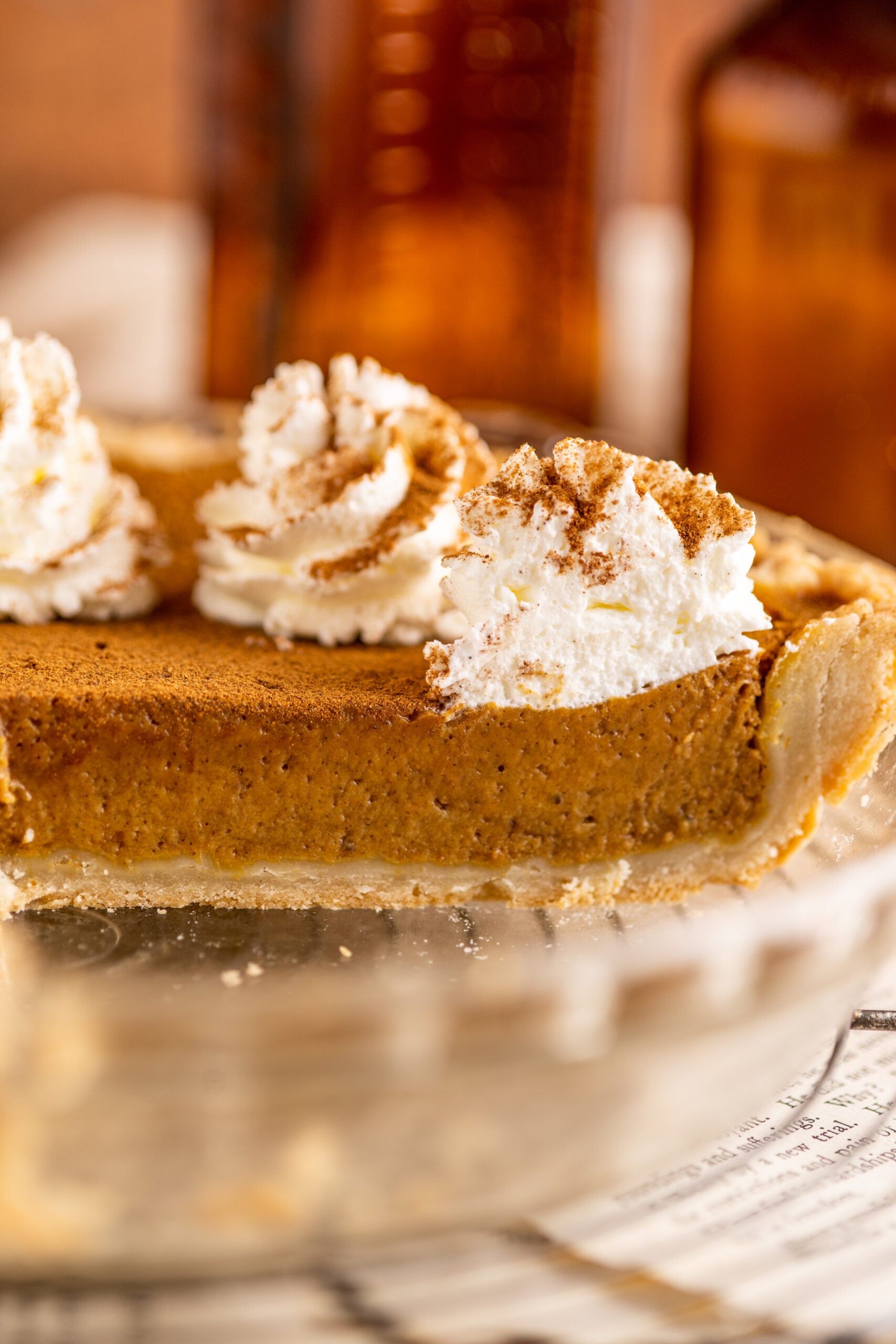 Pumpkin Custard Pie in a clear pie dish