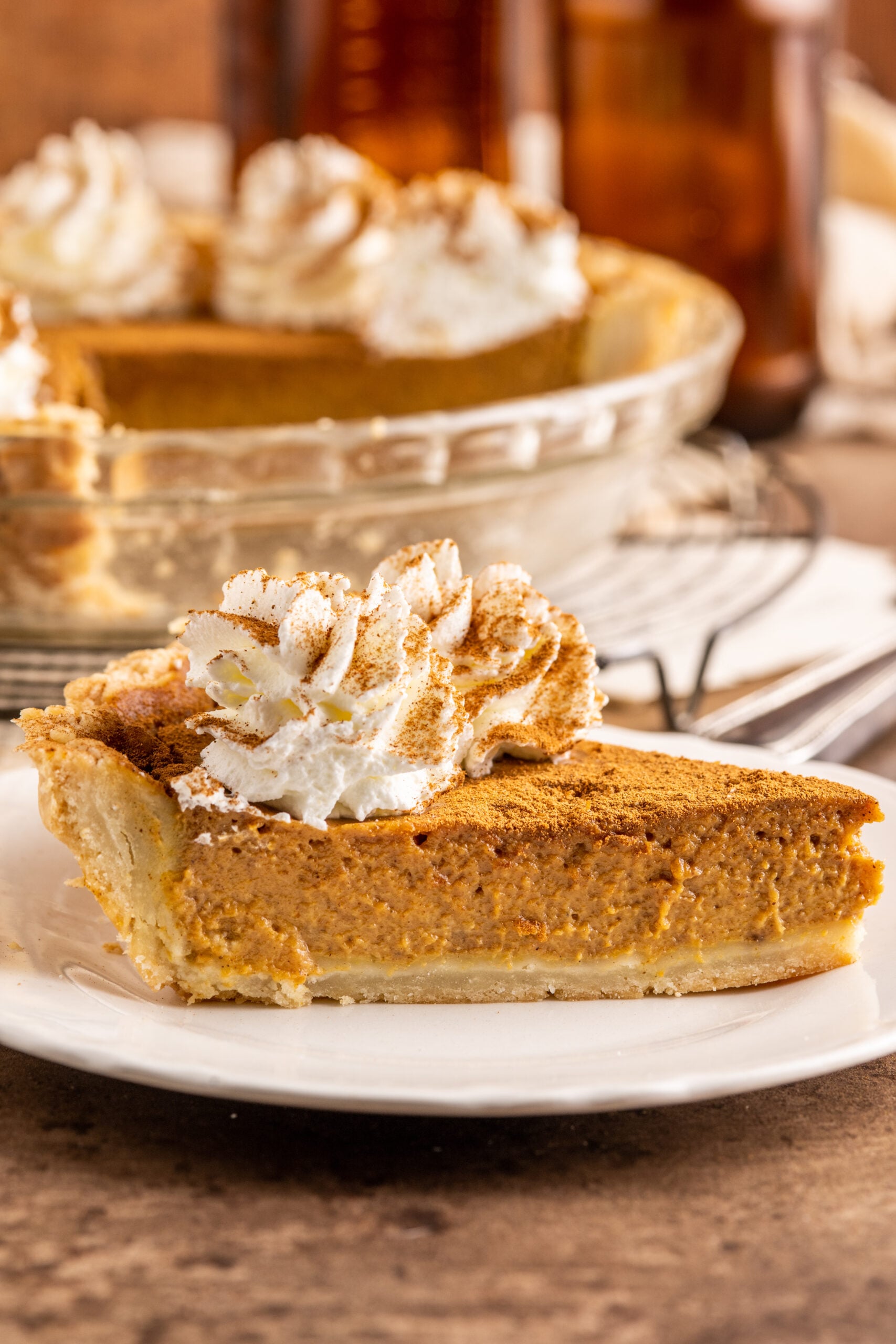 Pumpkin Custard Pie slice on a white plate