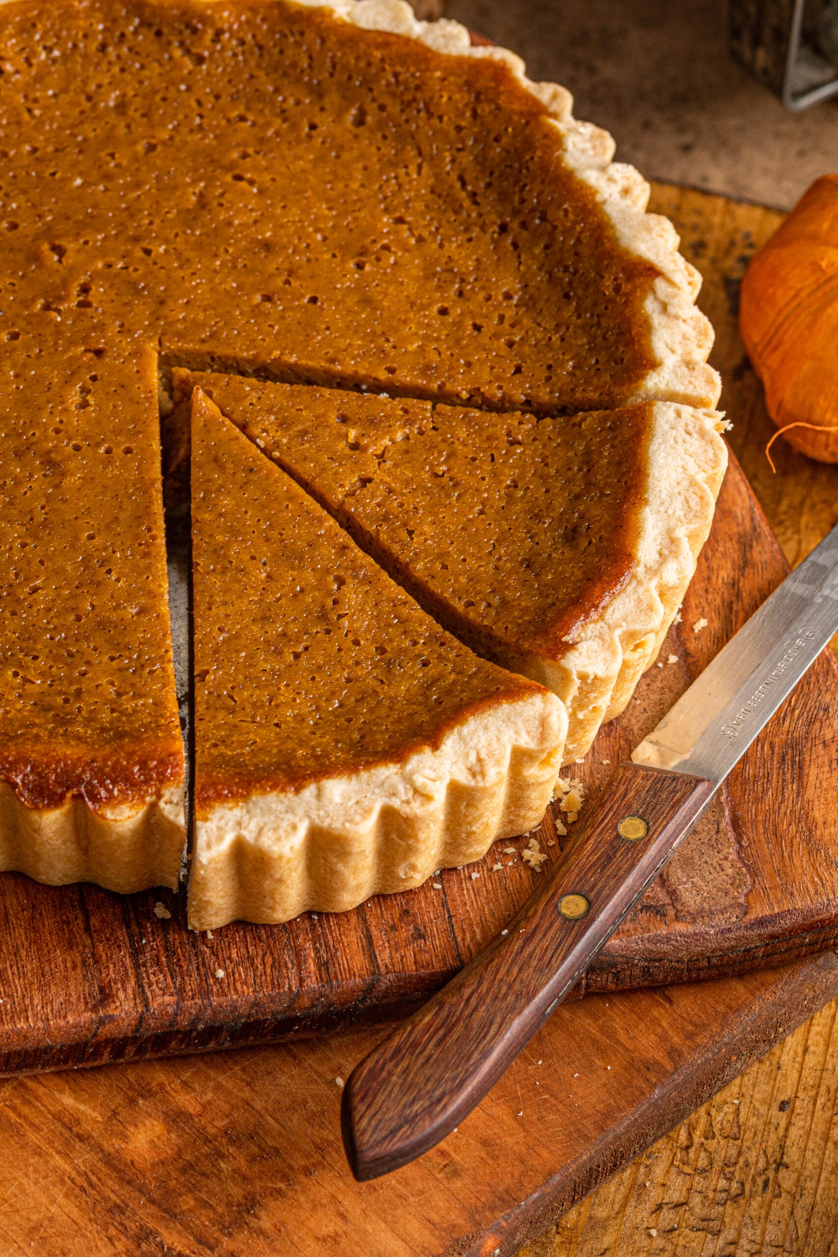 Overhead shot of the Pumpkin Pie Tart on a wooden cutting board
