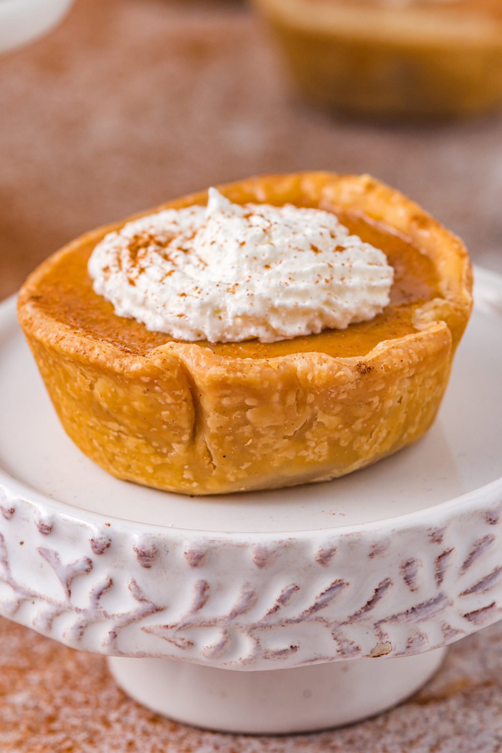 Mini Pumpkin Pie on a white cake stand 