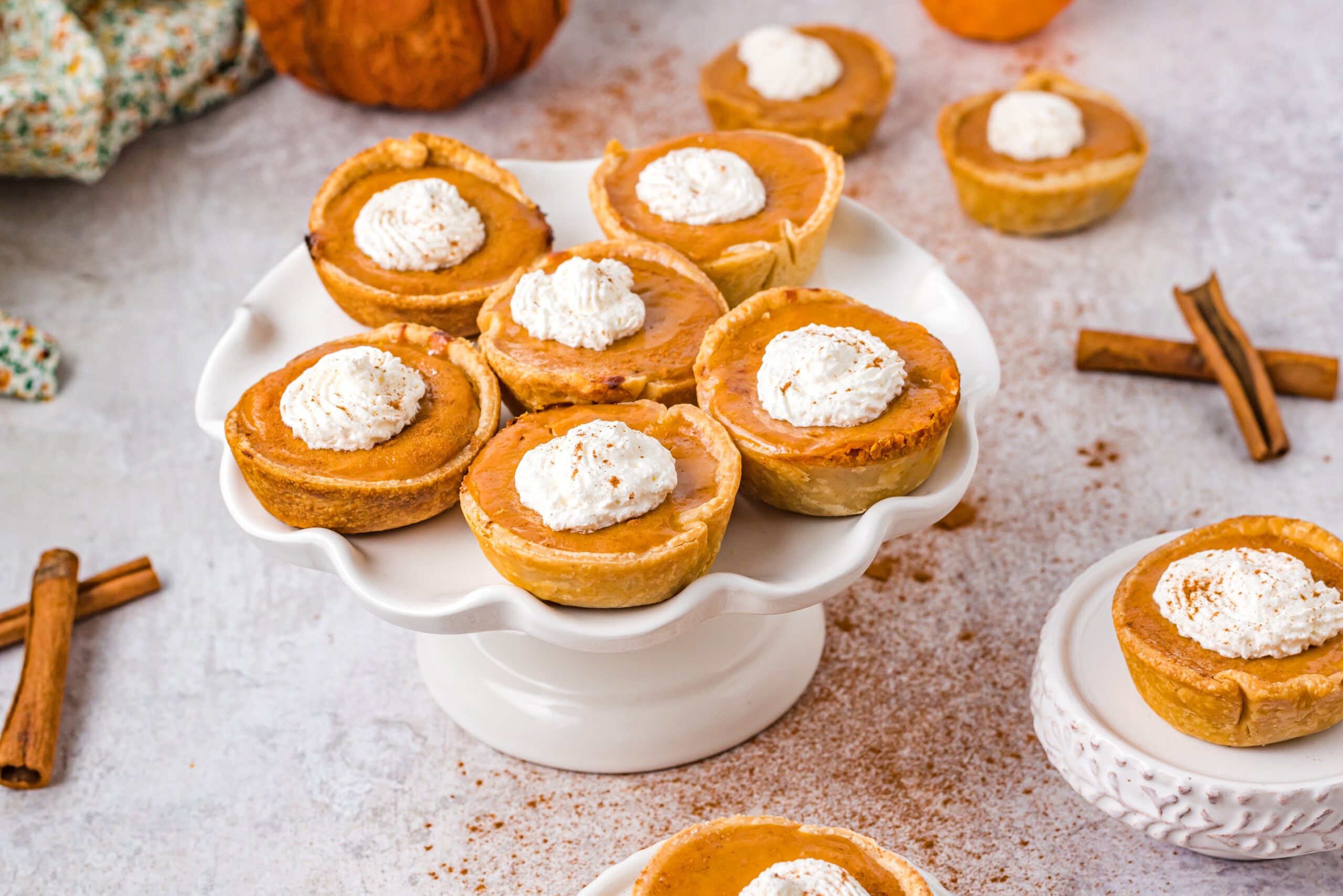 Mini Pumpkin Pies on a white serving tray 