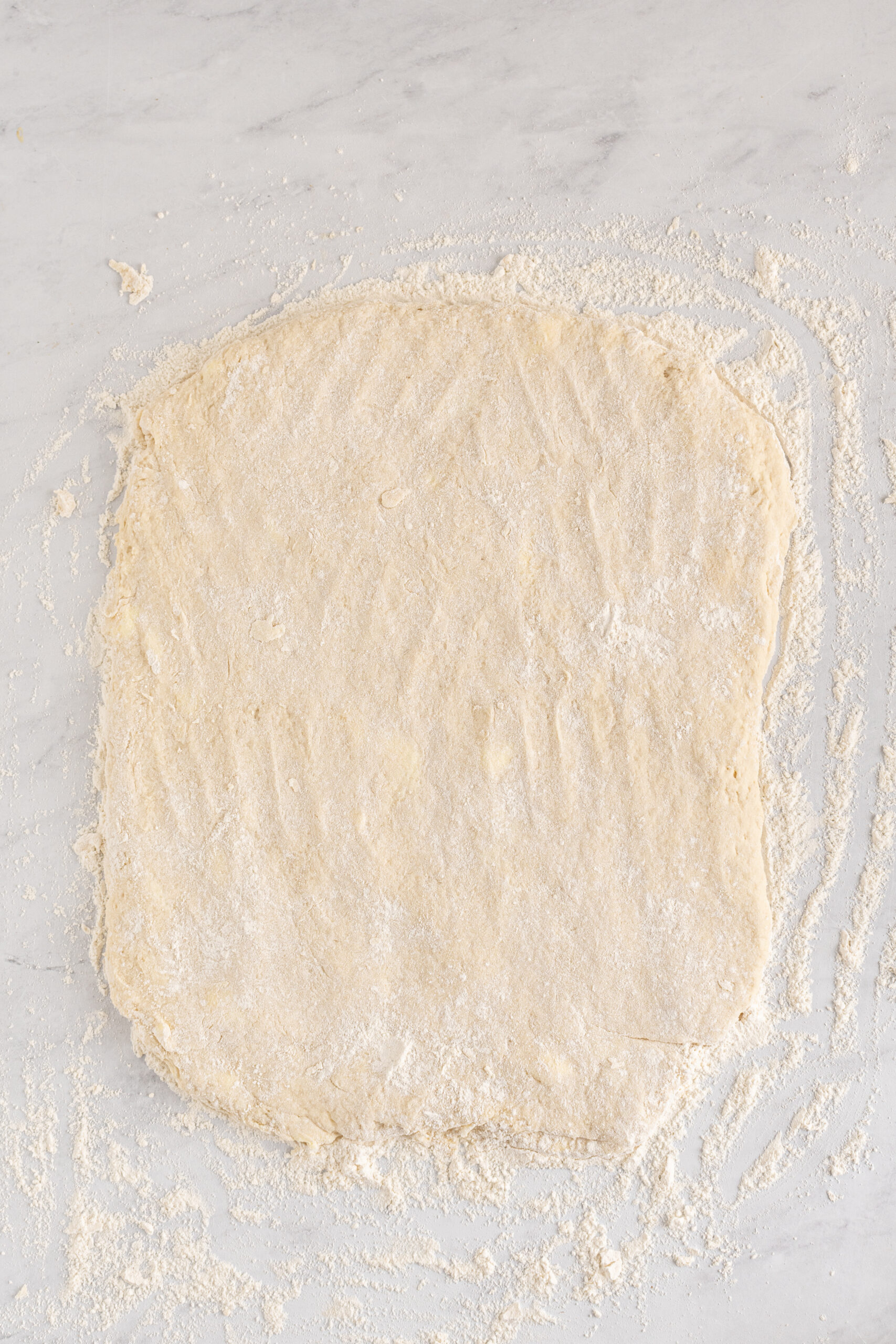 Overhead shot of the dough rolled out ready to be cut.