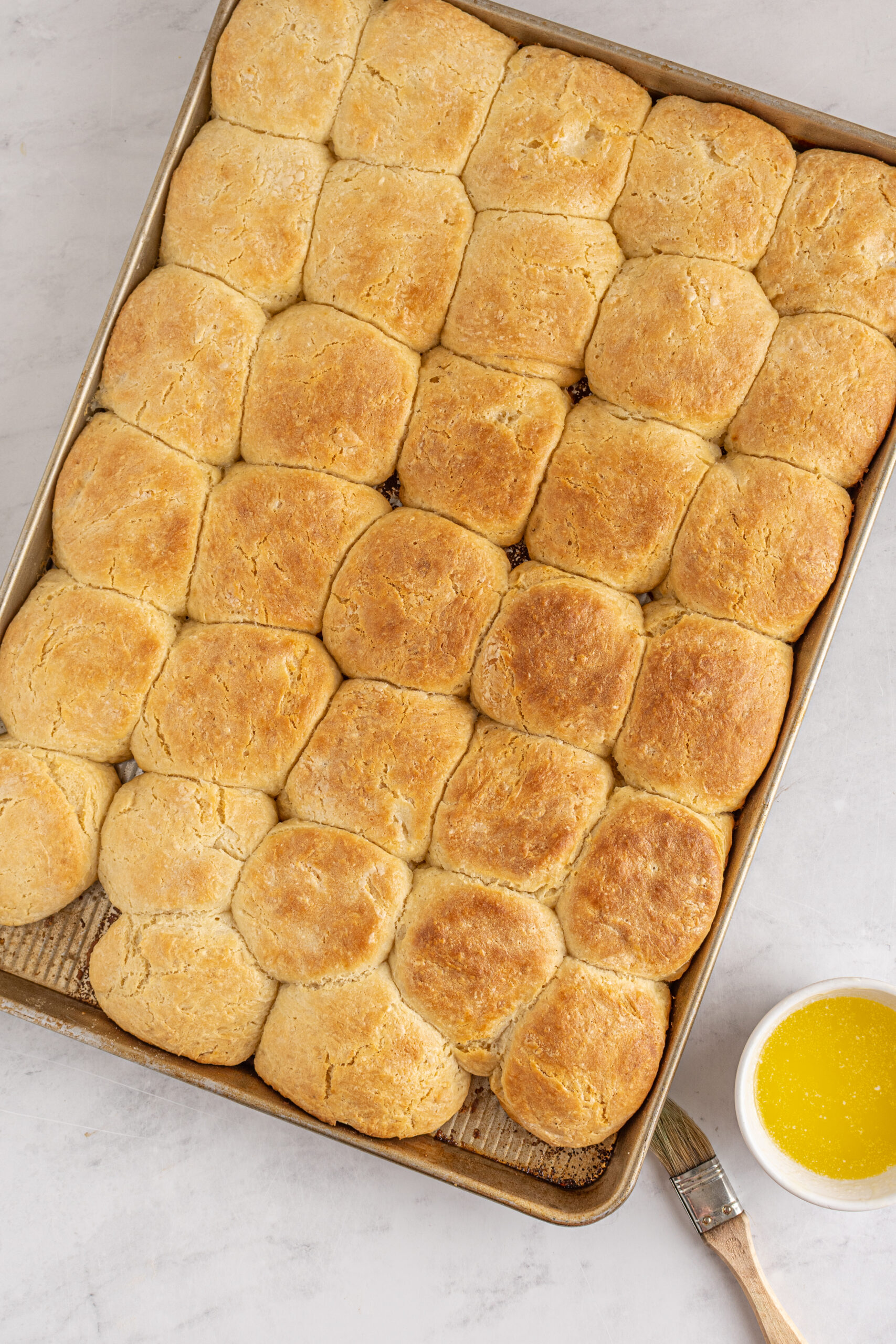 Overhead shot of the finished biscuits in the baking pan.