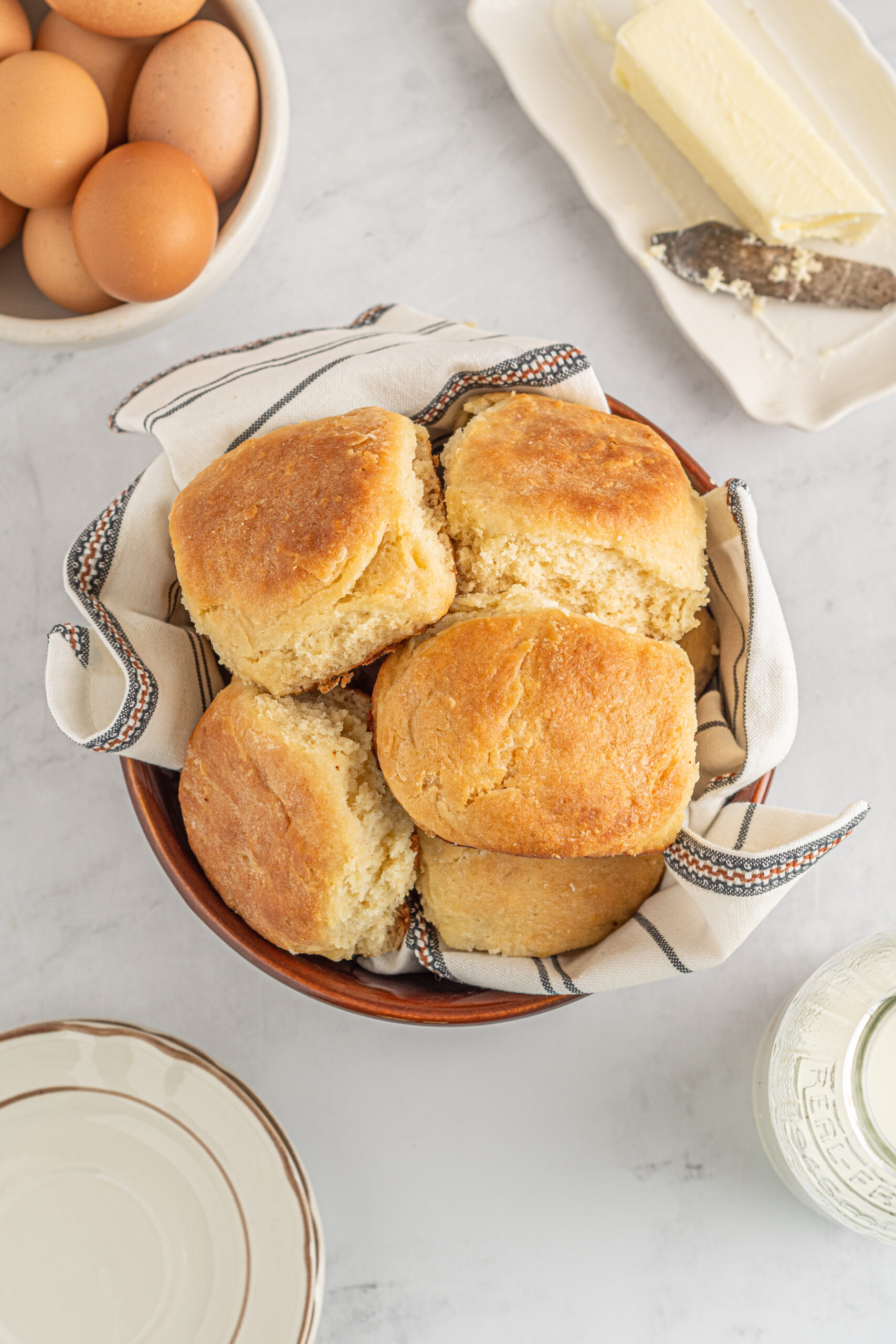Angel Biscuits in a brown bowl with a white and black linen.