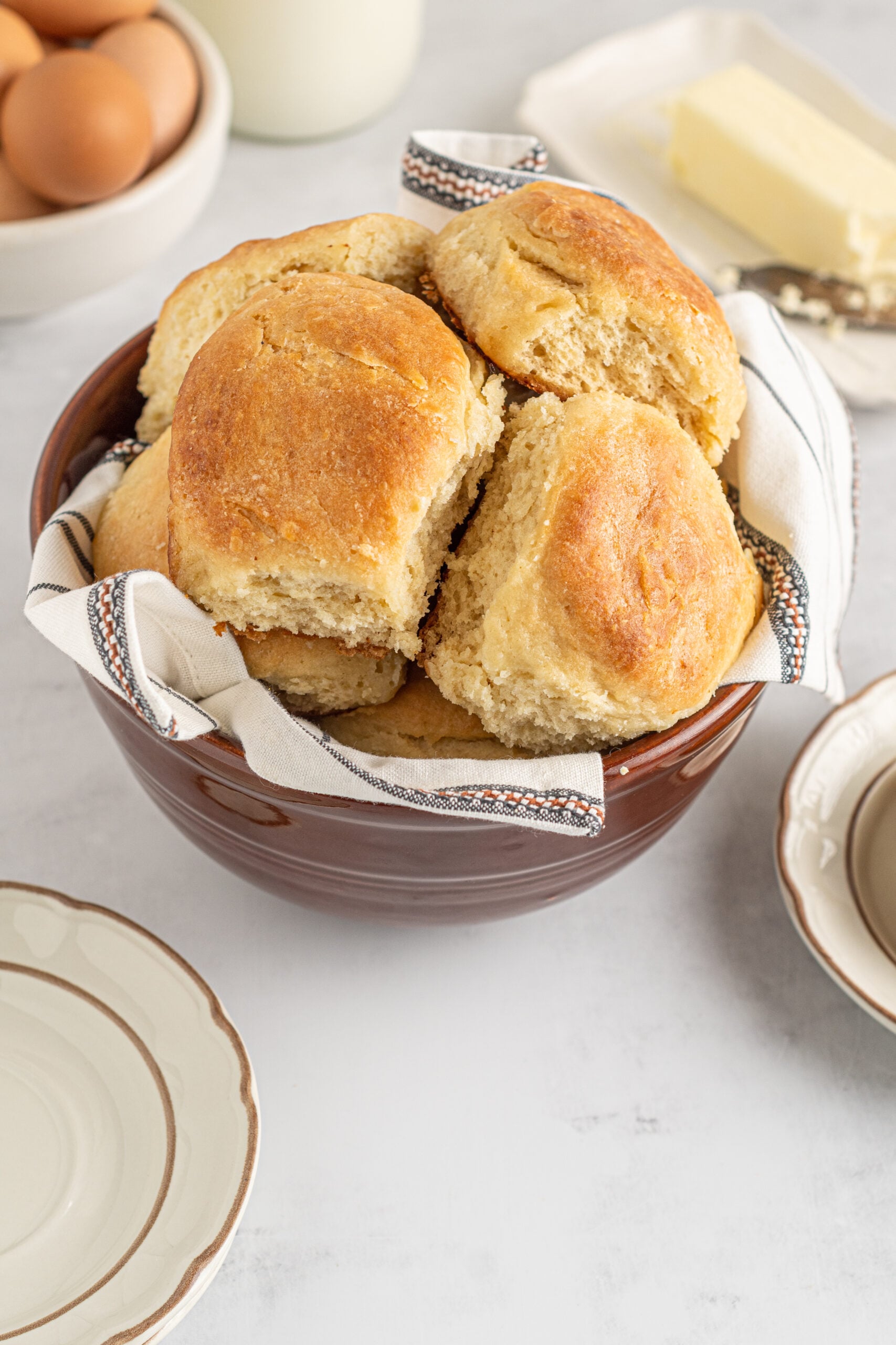 Angel Biscuits in a brown bowl with a white and black linen.