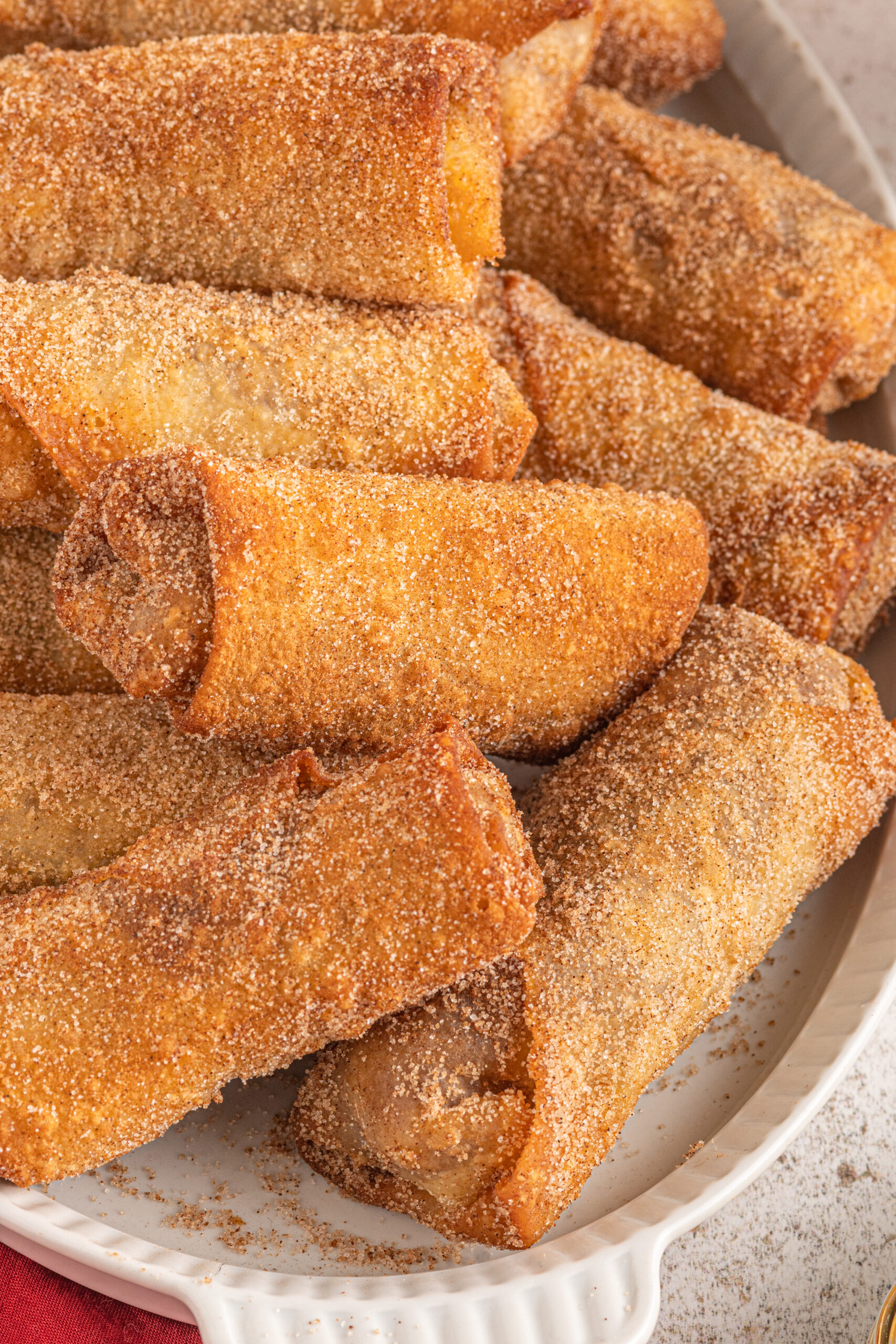 Close up of the cinnamon sugar coating of the dessert egg rolls.