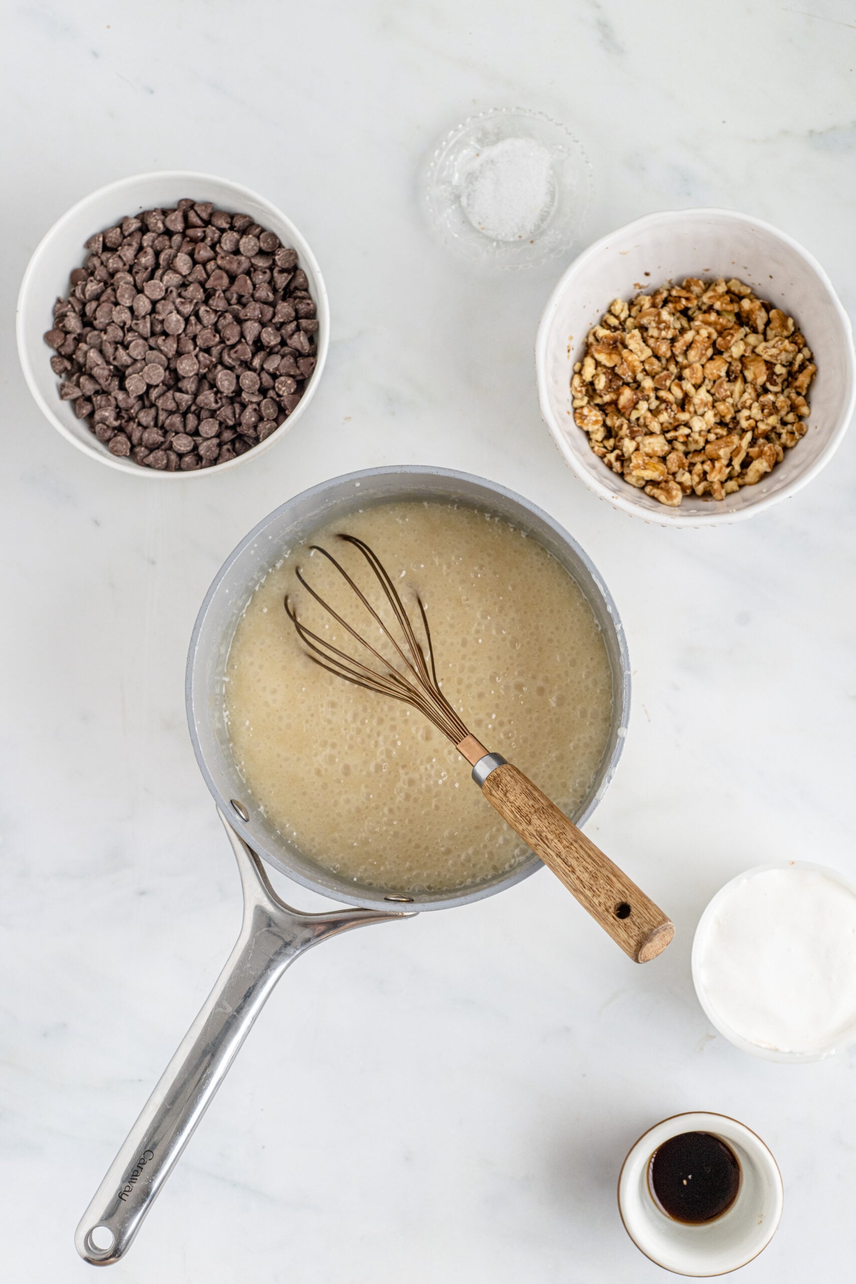 Overhead shot of ingredients melted in saucepan.