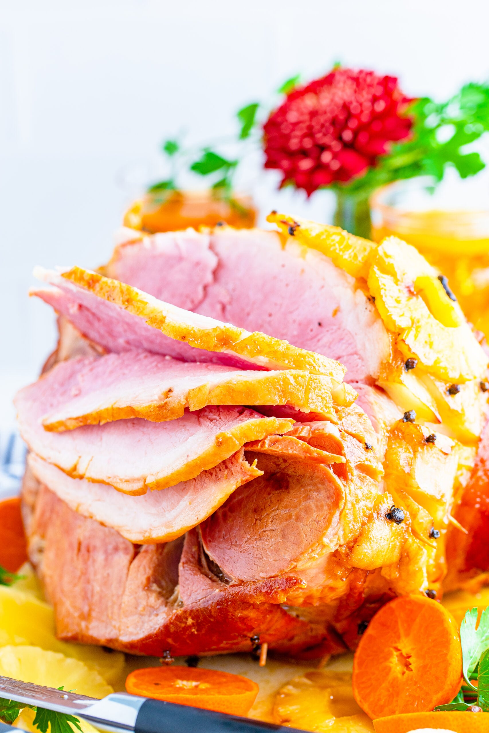Side image showing the slices of the full baked ham.