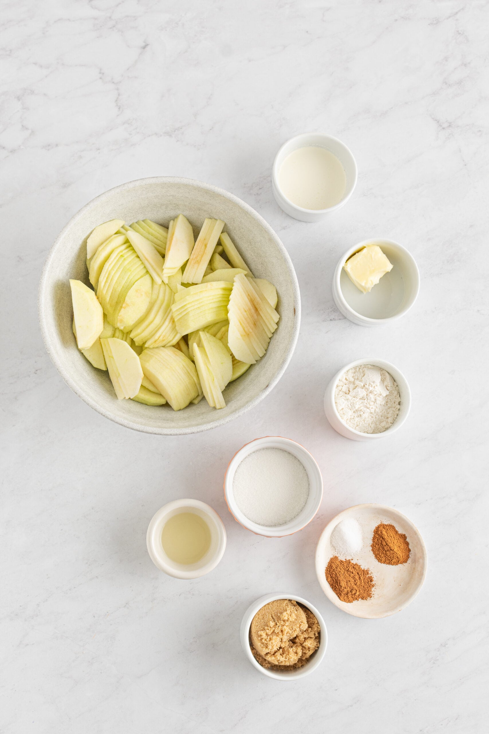 Overhead shot of ingredients needed to make Dutch apple pie. 