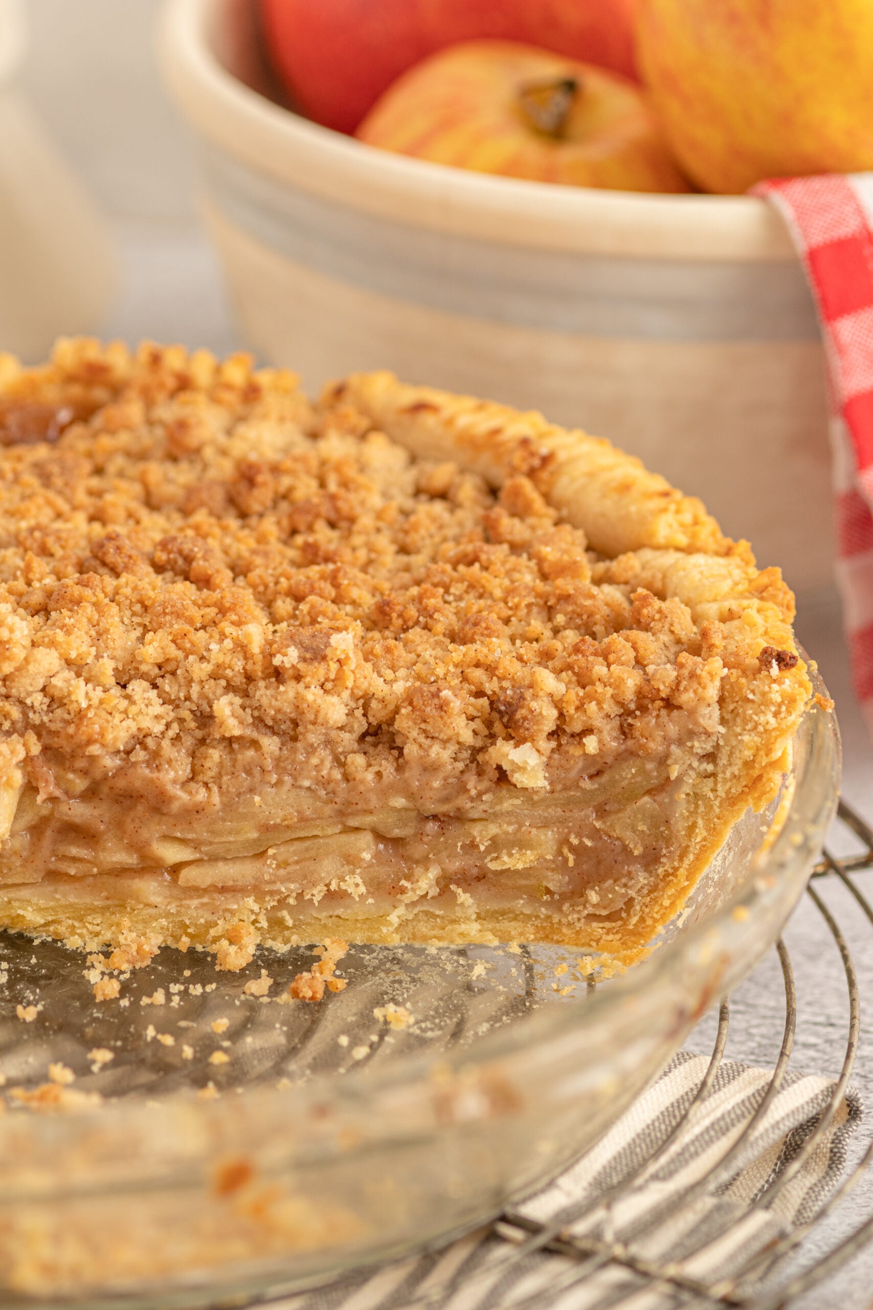 A side shot showing the apple layers inside of the Dutch apple pie.