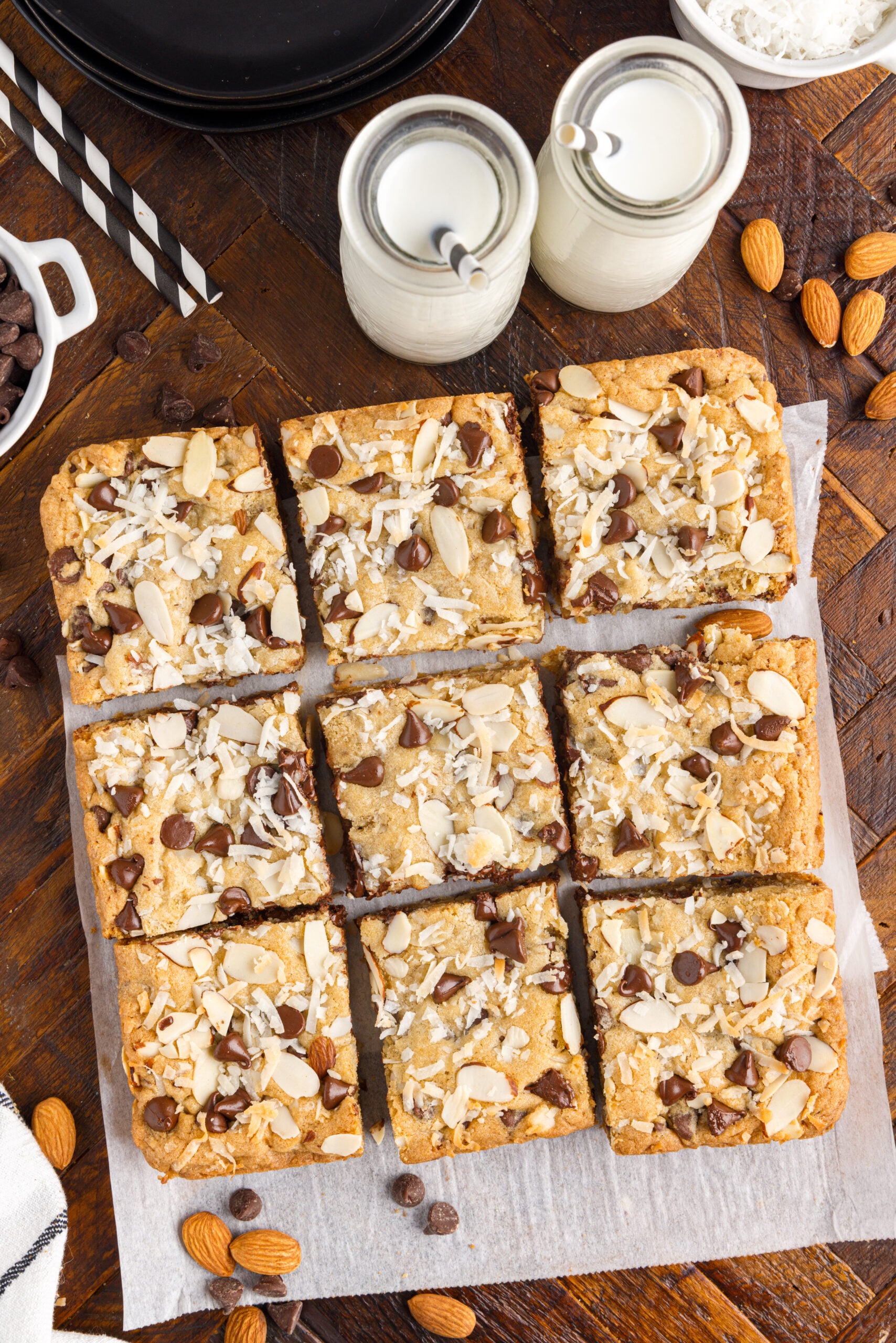Overhead view of the bars cut into nine pieces on a piece of parchment paper.