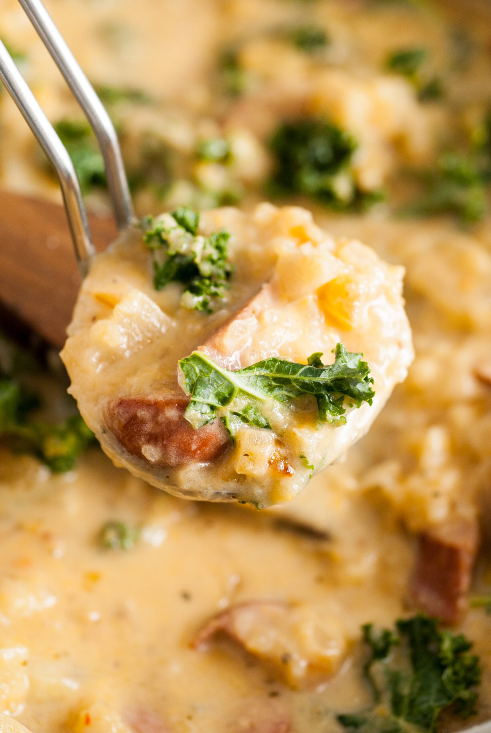 A ladle full of Kielbasa Potato Soup. 