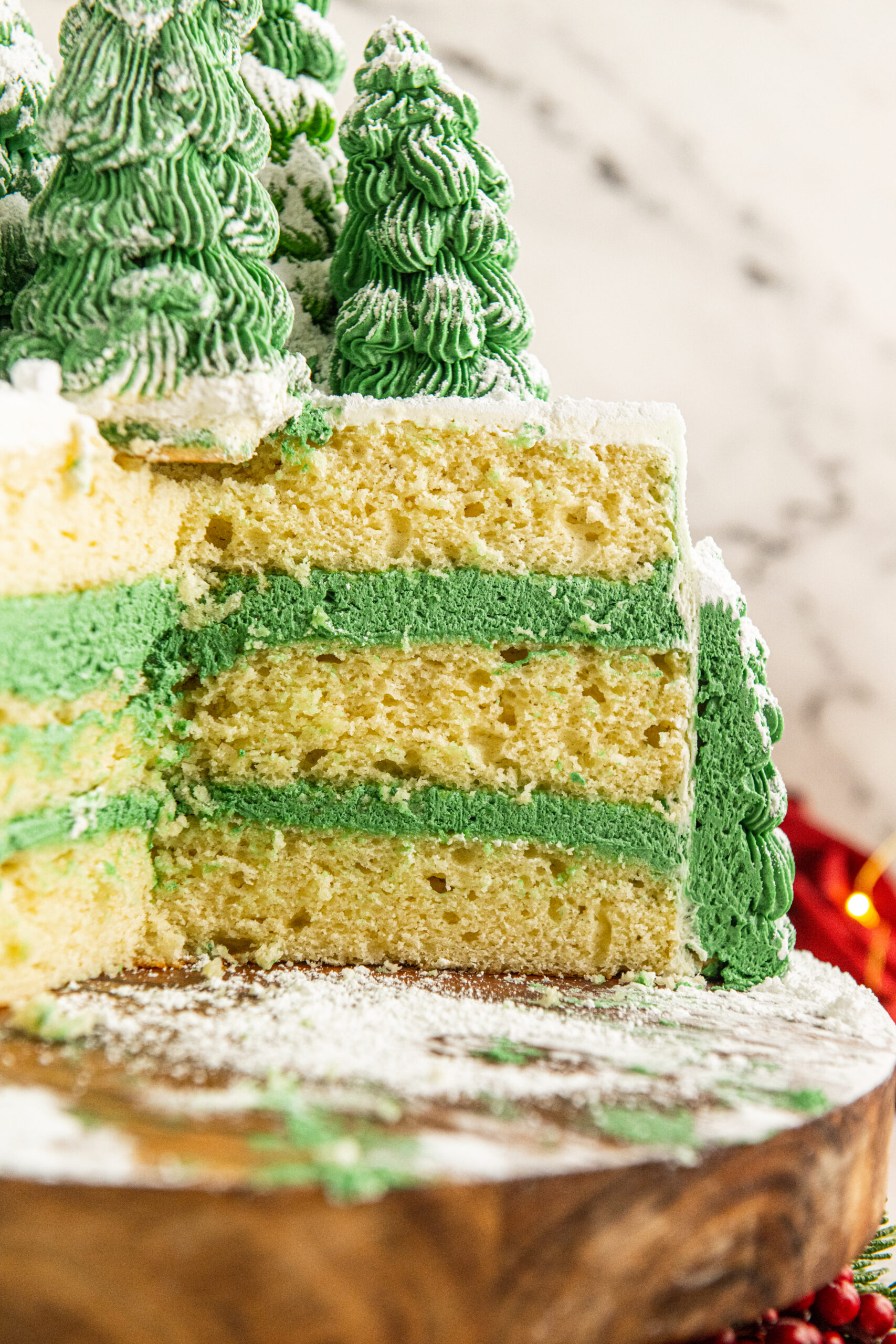 A center shot of the white and green layers inside the Christmas Tree Cake.