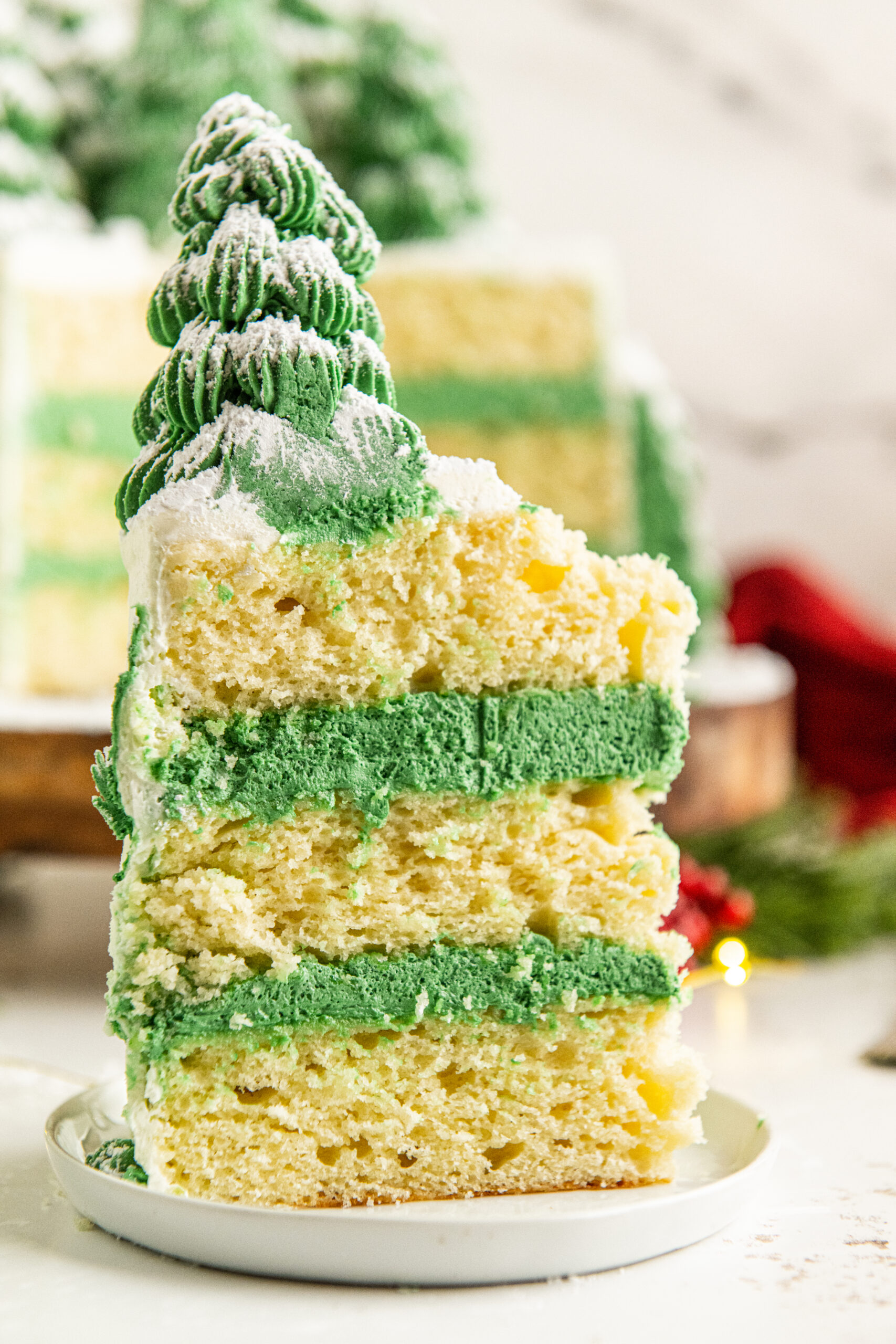 Christmas Tree cake slice on a white plate