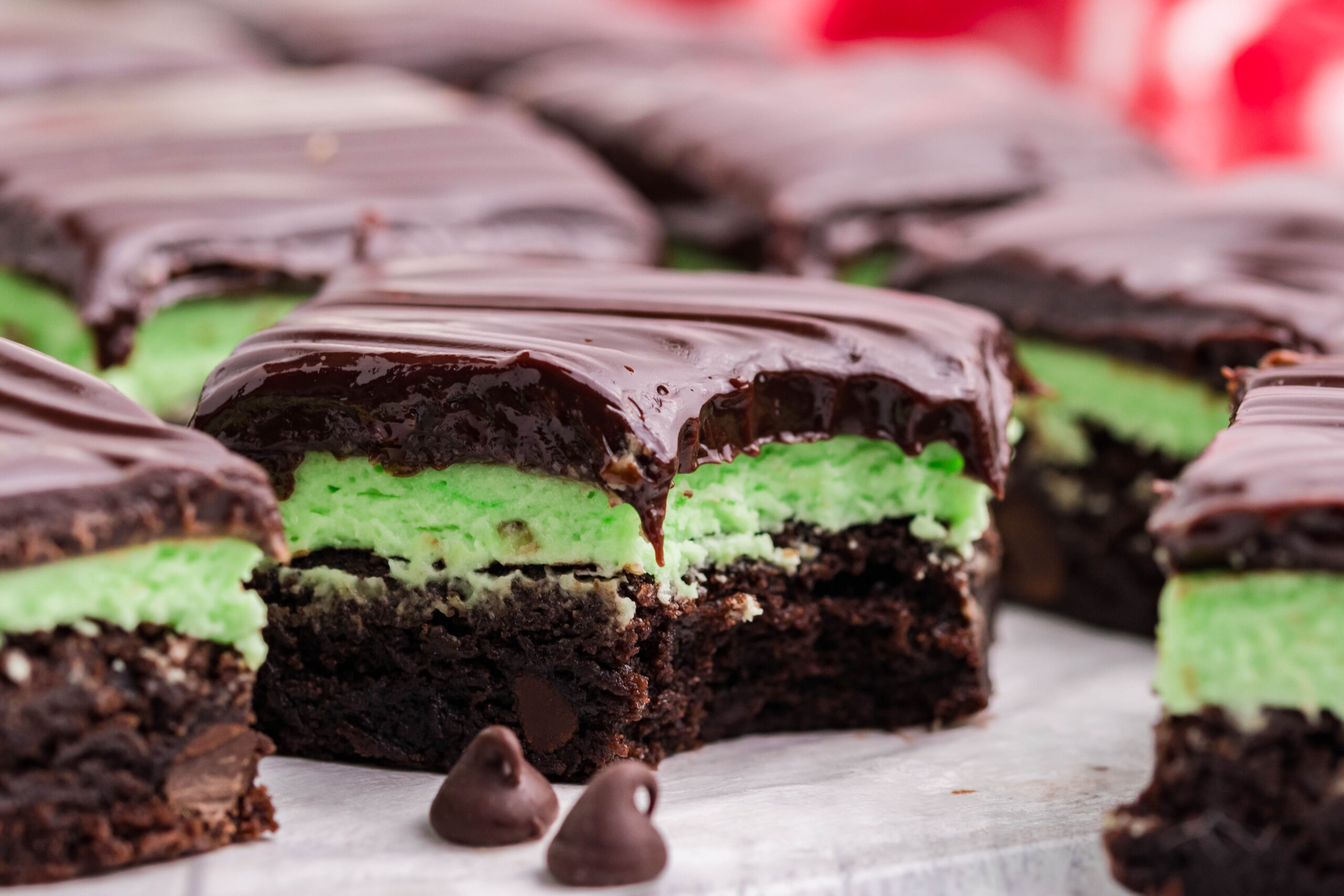 Up close view of a bite removed from the chocolate mint brownies.