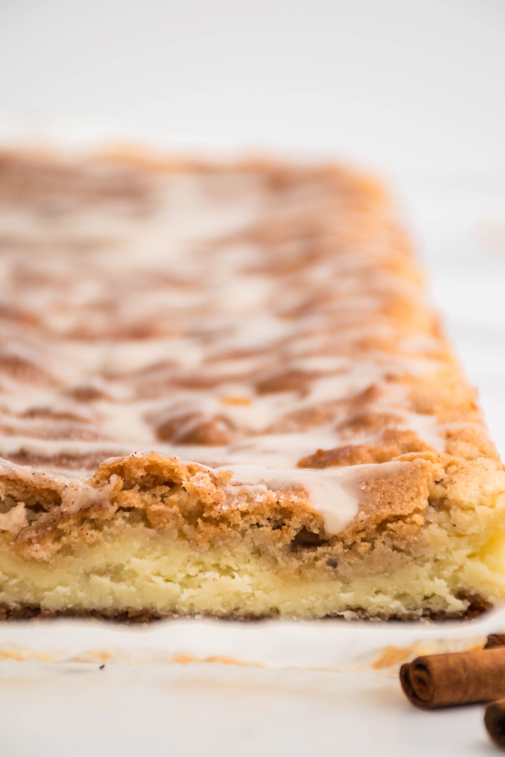 A side view of the sliced cheesecake bars showing the inside filling.