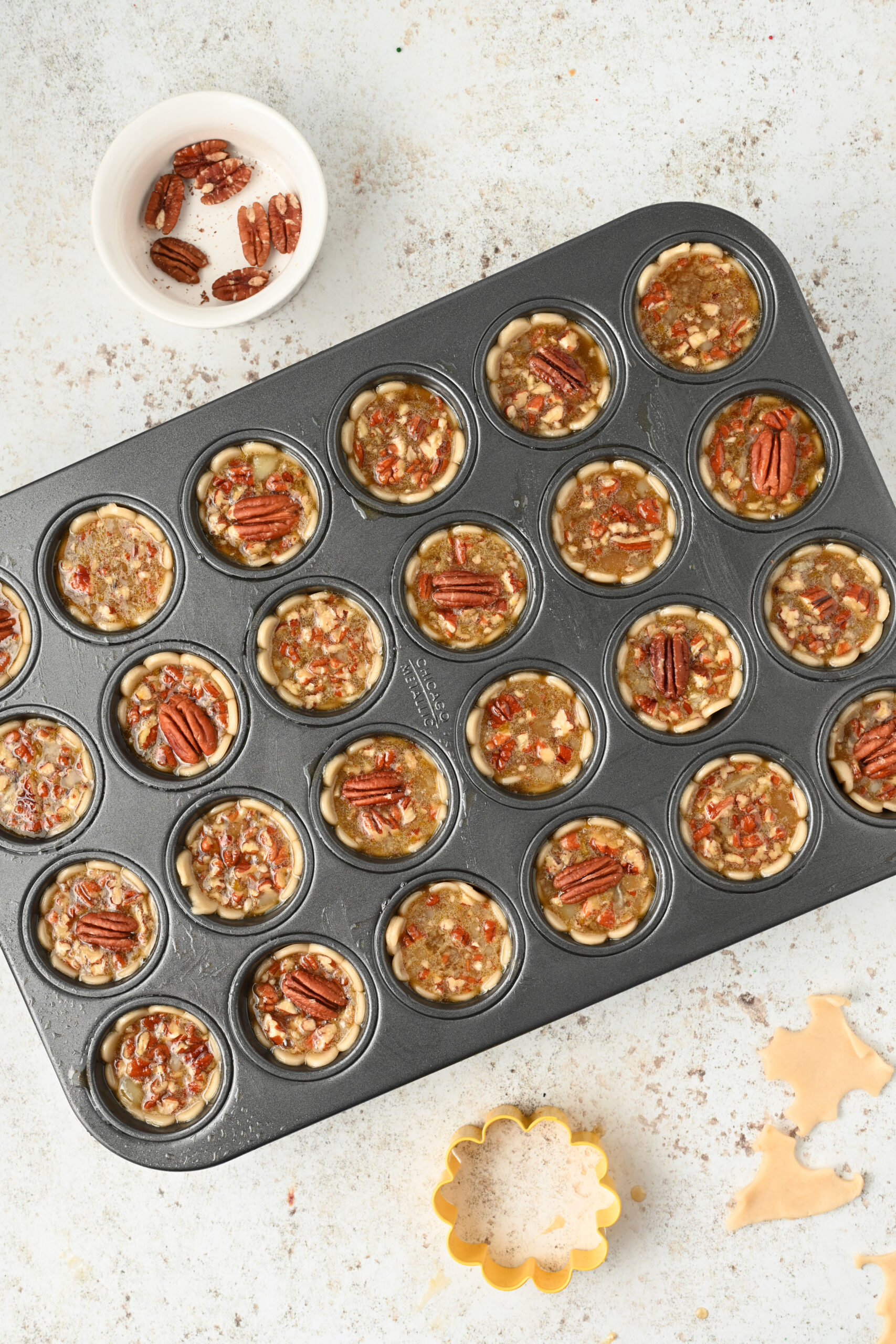 Overhead view of the baked mini pies in the baking tray.