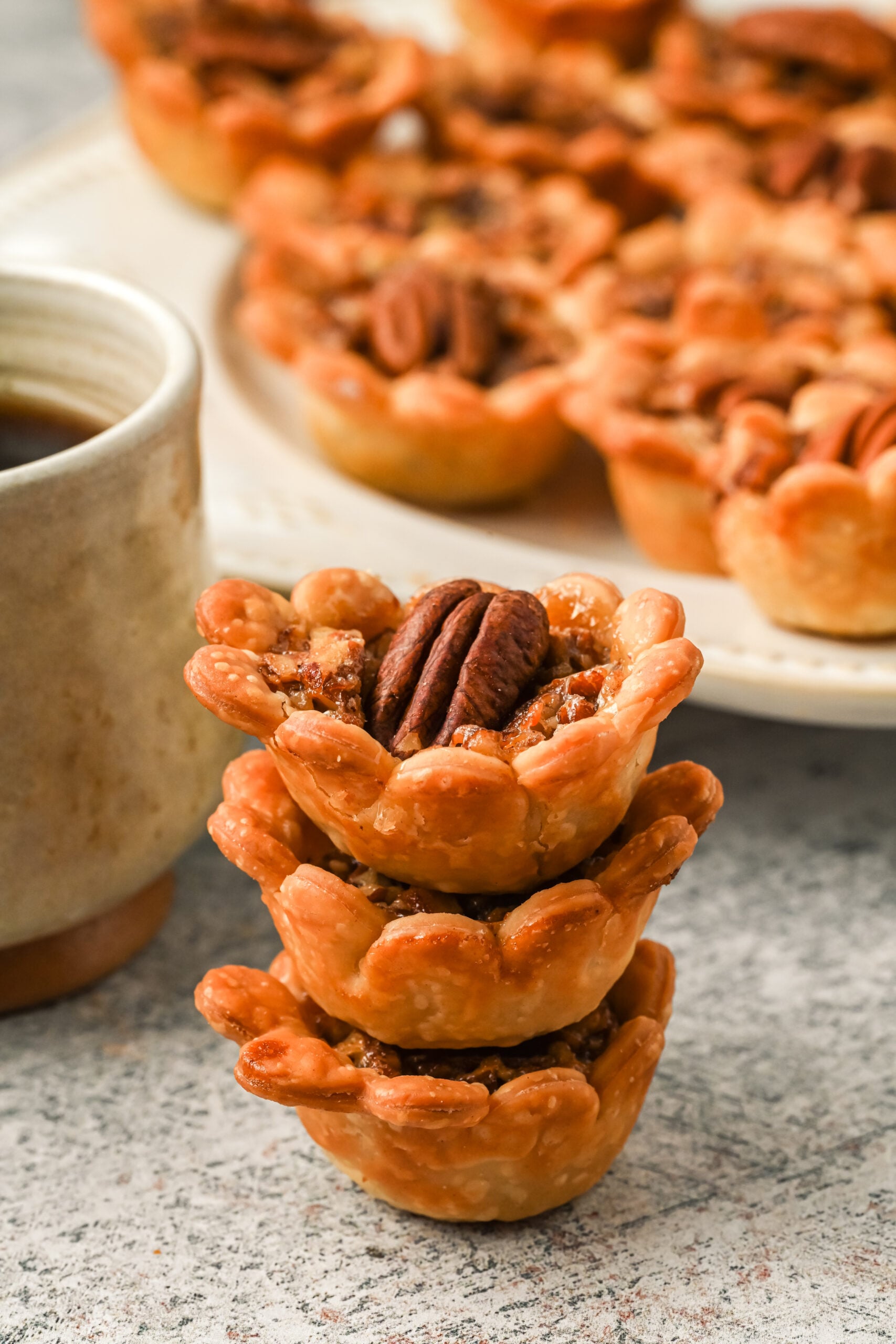 Three mini pies stacked on top of each other.